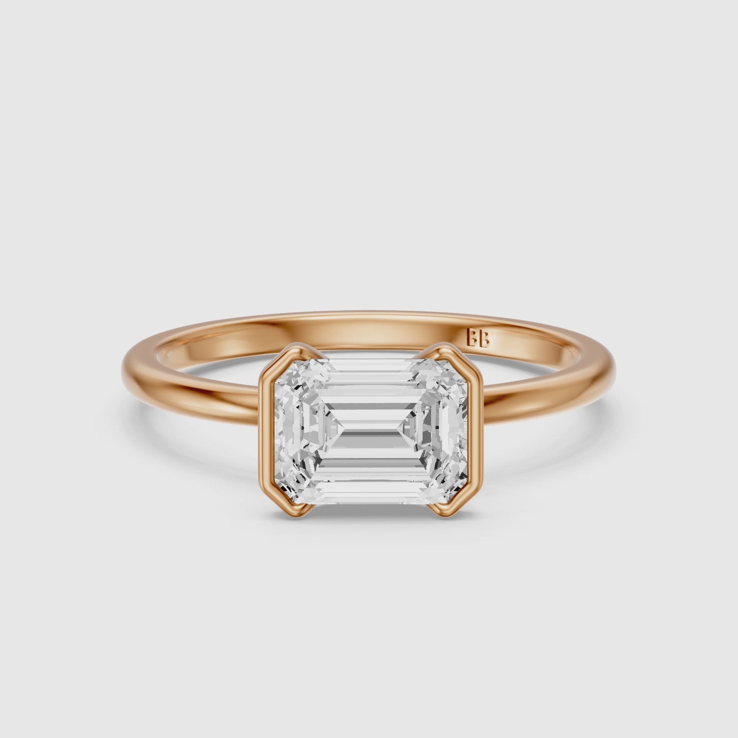 Load video: Kierra Emerald Half Bezel East West Lab Grown Diamond Ring