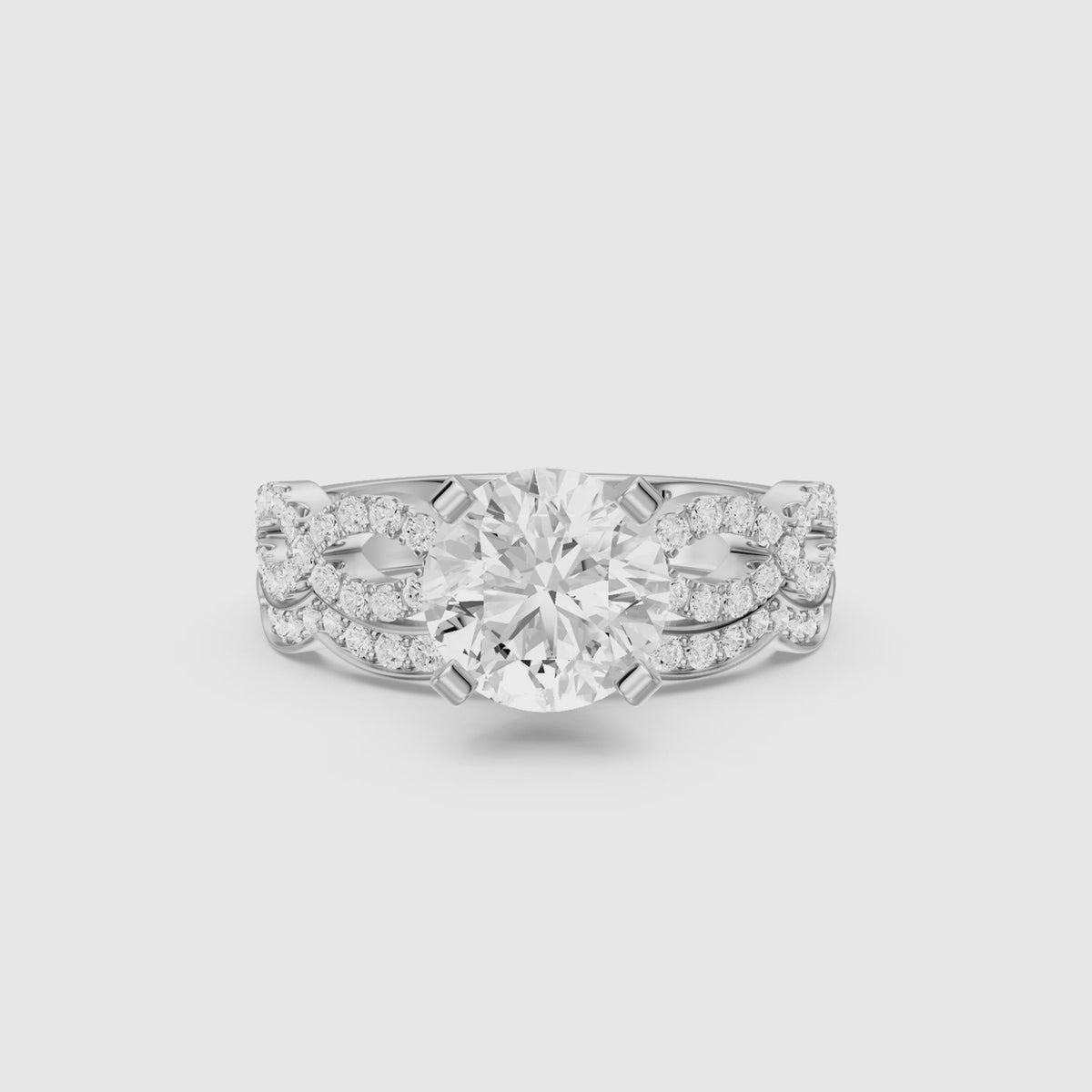 Load video: Bertina Round Lab Grown Diamond Infinity Twist Bridal Set