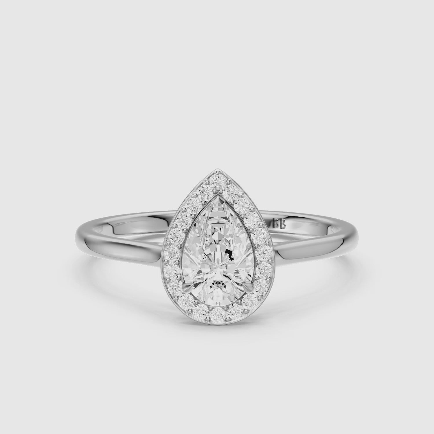Load video: Nina Pear Cut Halo Cathedral Style Lab Grown Diamond Ring