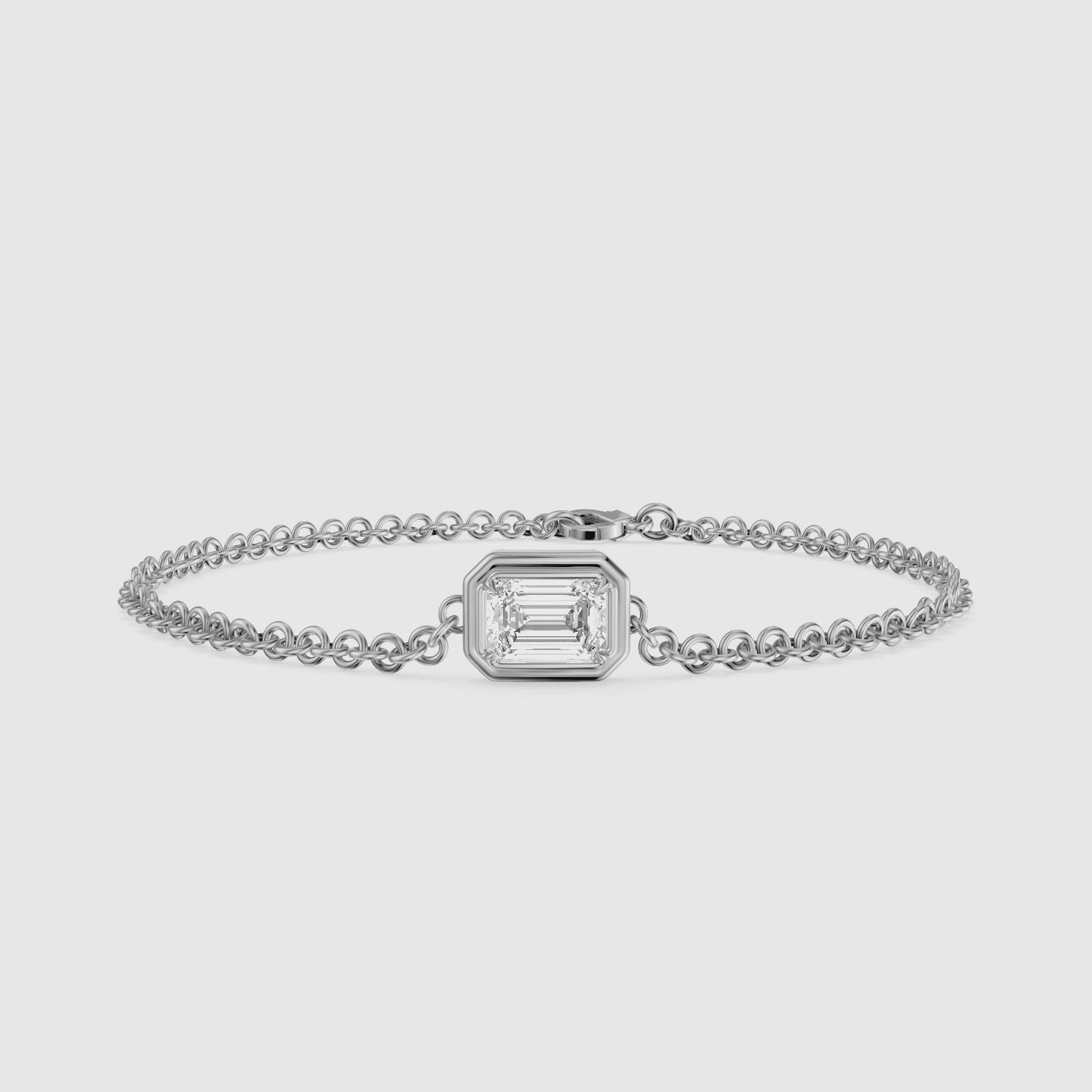 Load video: Keely East West Emerald Cut Lab Grown Diamond Single Stone Bezel Bracelet