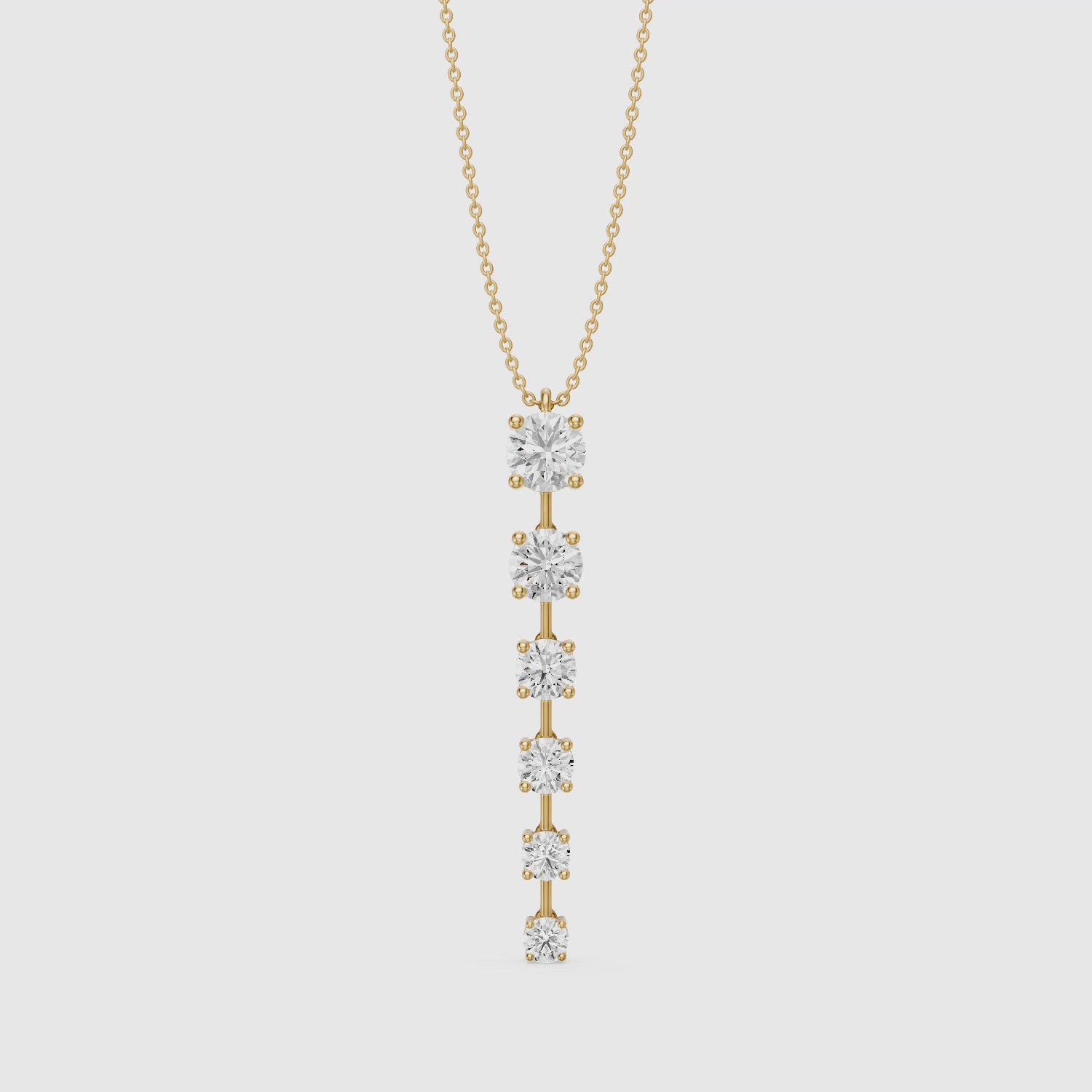 Load video: Delia Graduated Round Lab Grown Diamond Drop Pendant