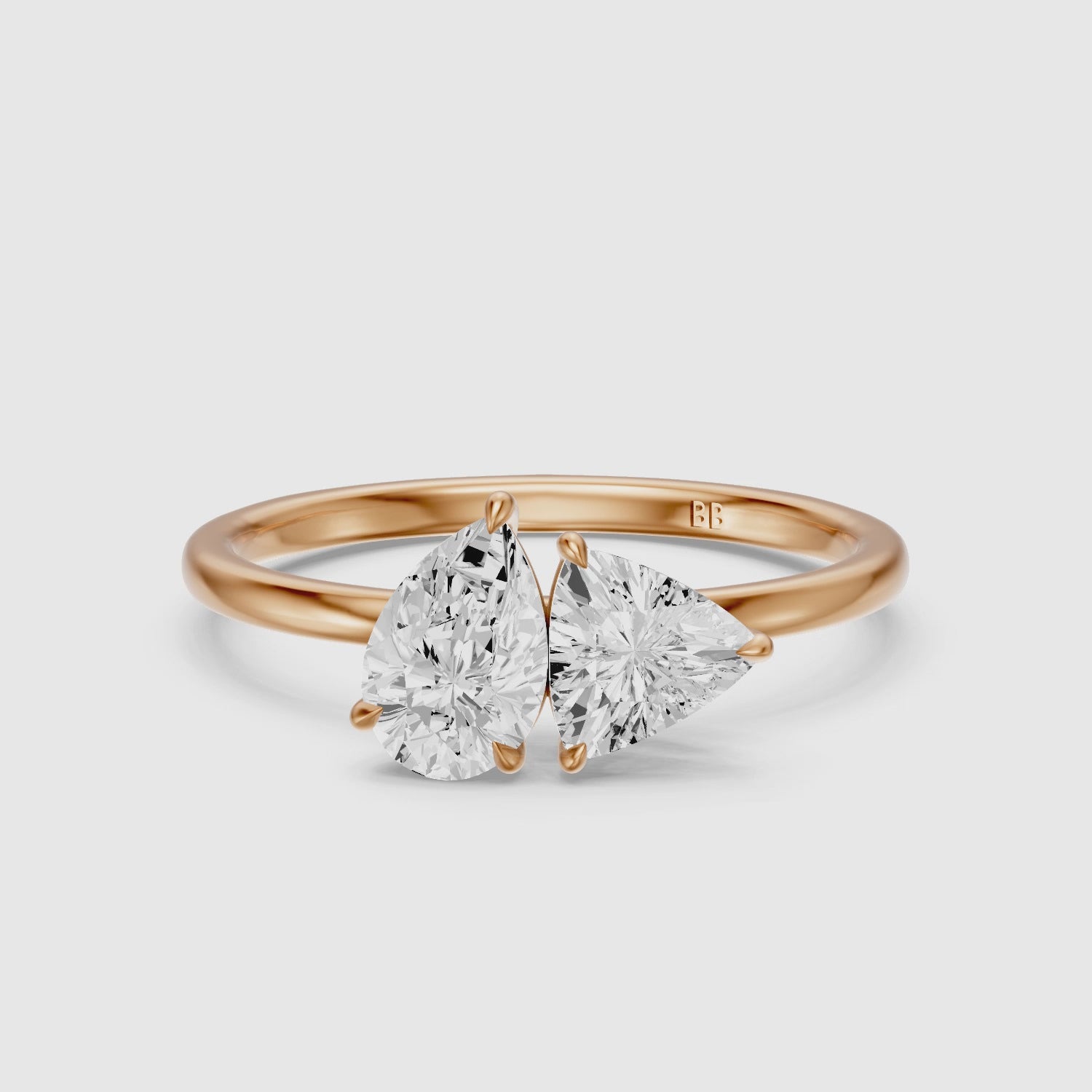 Load video: Roselyn Toi Et Moi Engagement Ring With Pear and Trillion Cut Lab Grown Diamond