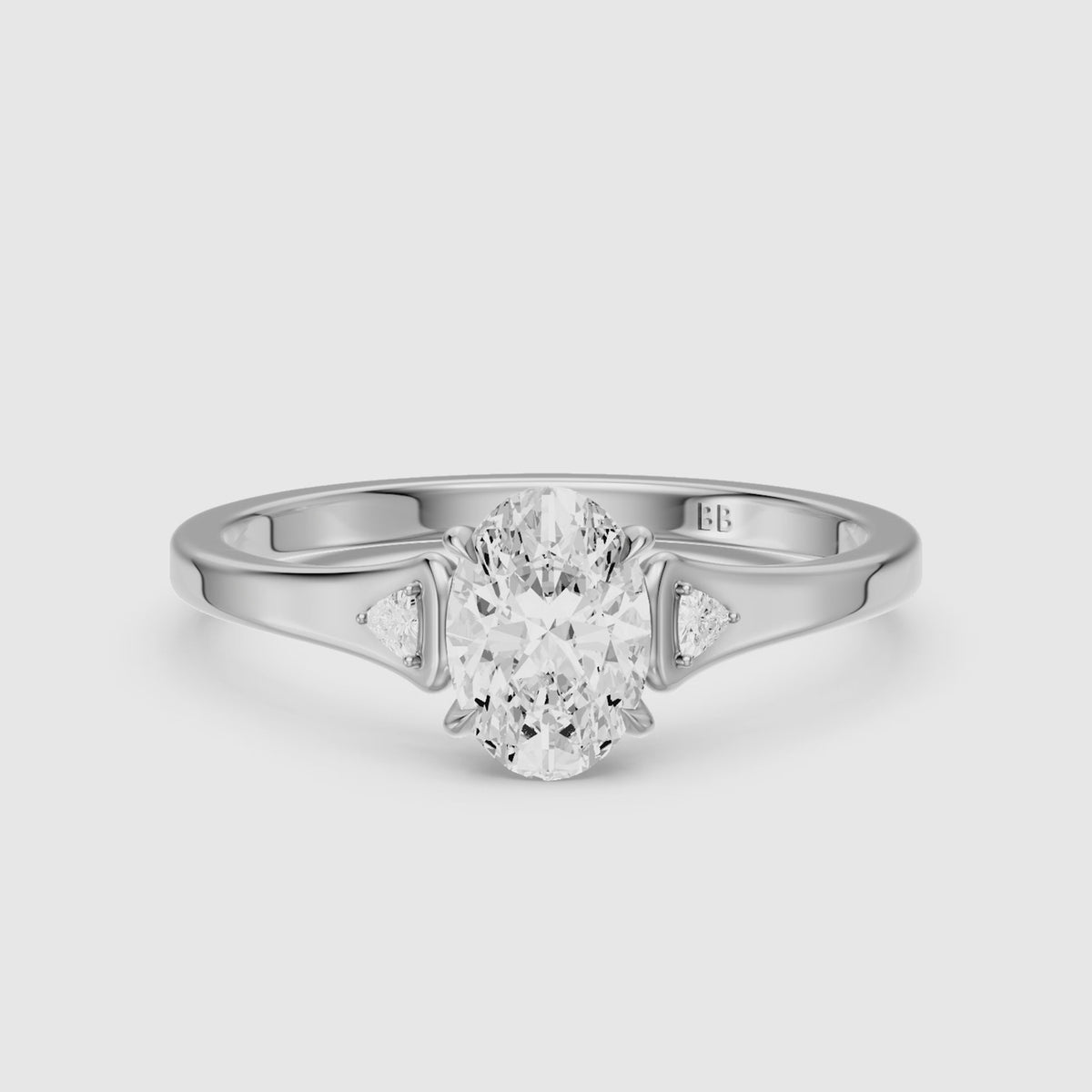 Load video: Maelle Oval Lab Grown Diamond Ring with Trillion Side Stones