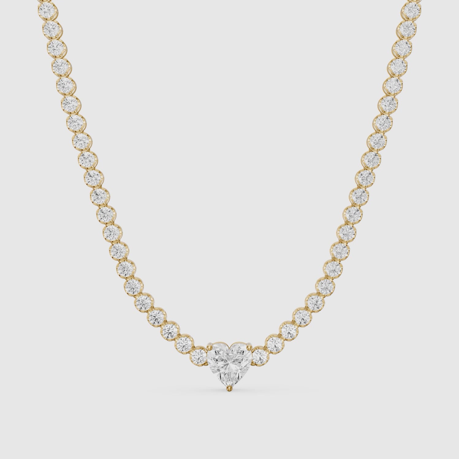 Load video: Mackenzie Round Bezel Lab Grown Diamond Heart Center Necklace