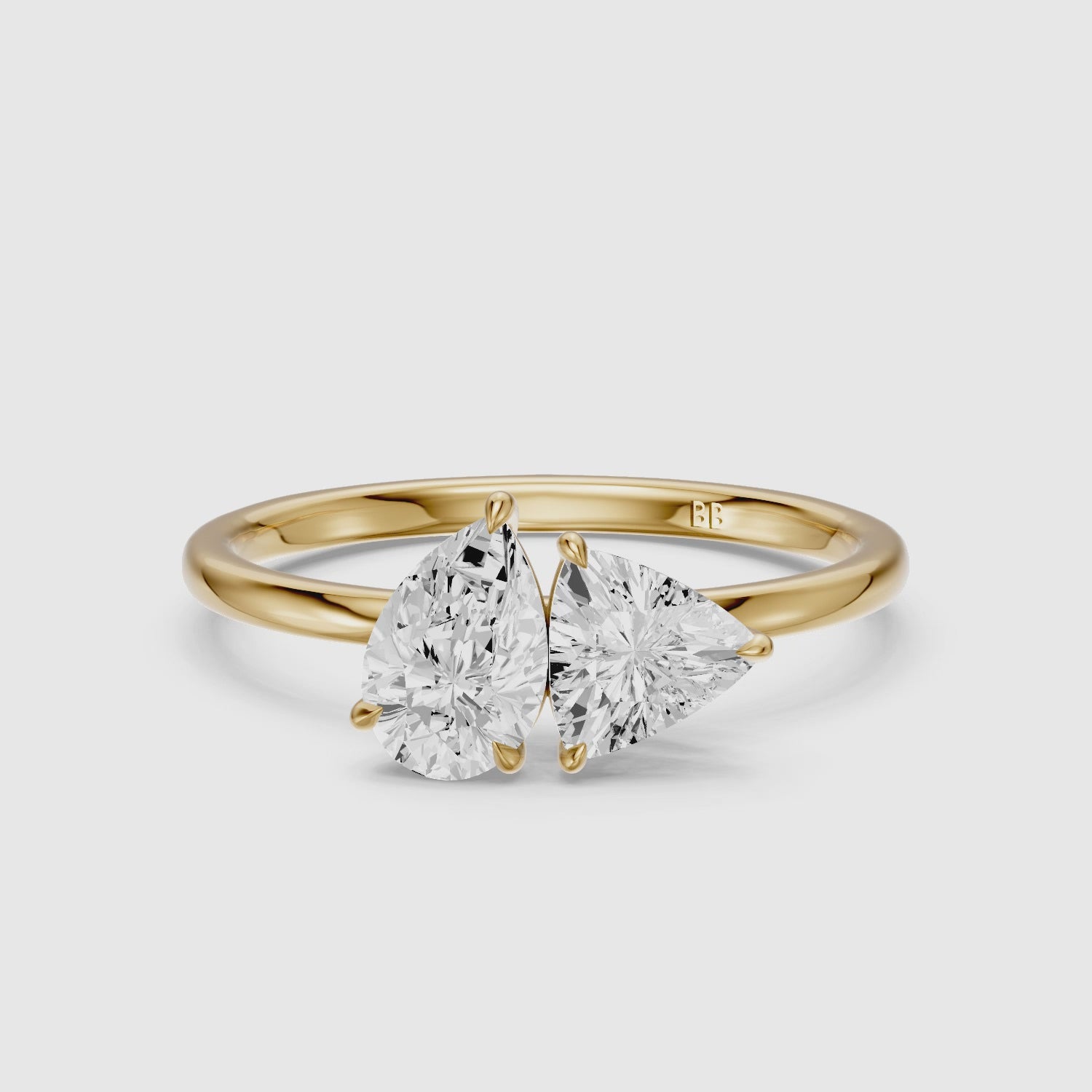 Load video: Roselyn Toi Et Moi Engagement Ring With Pear and Trillion Cut Lab Grown Diamond