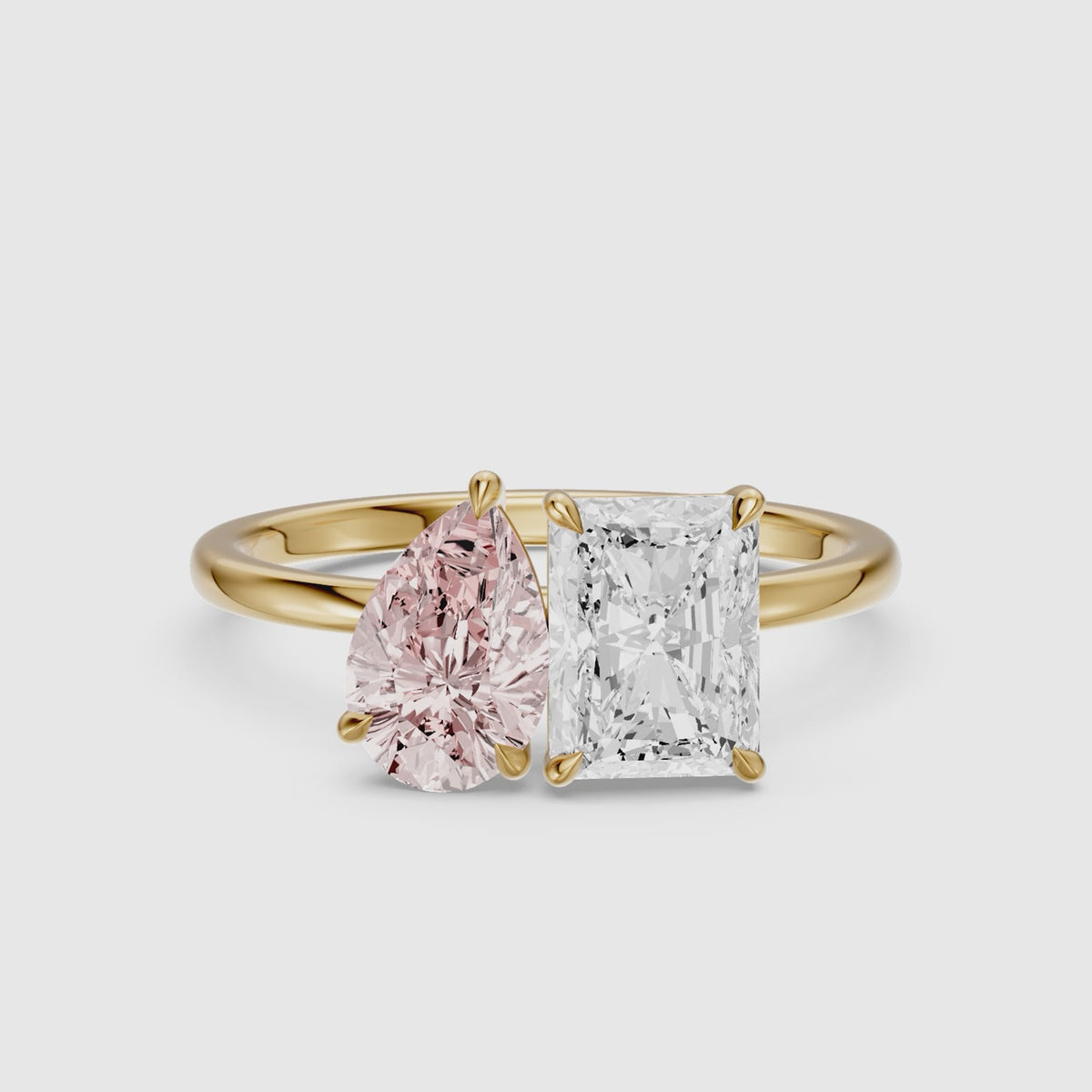 Load video: Zita Pink Pear and Radiant Cut Colored Lab Grown Diamond Toi et Moi Ring