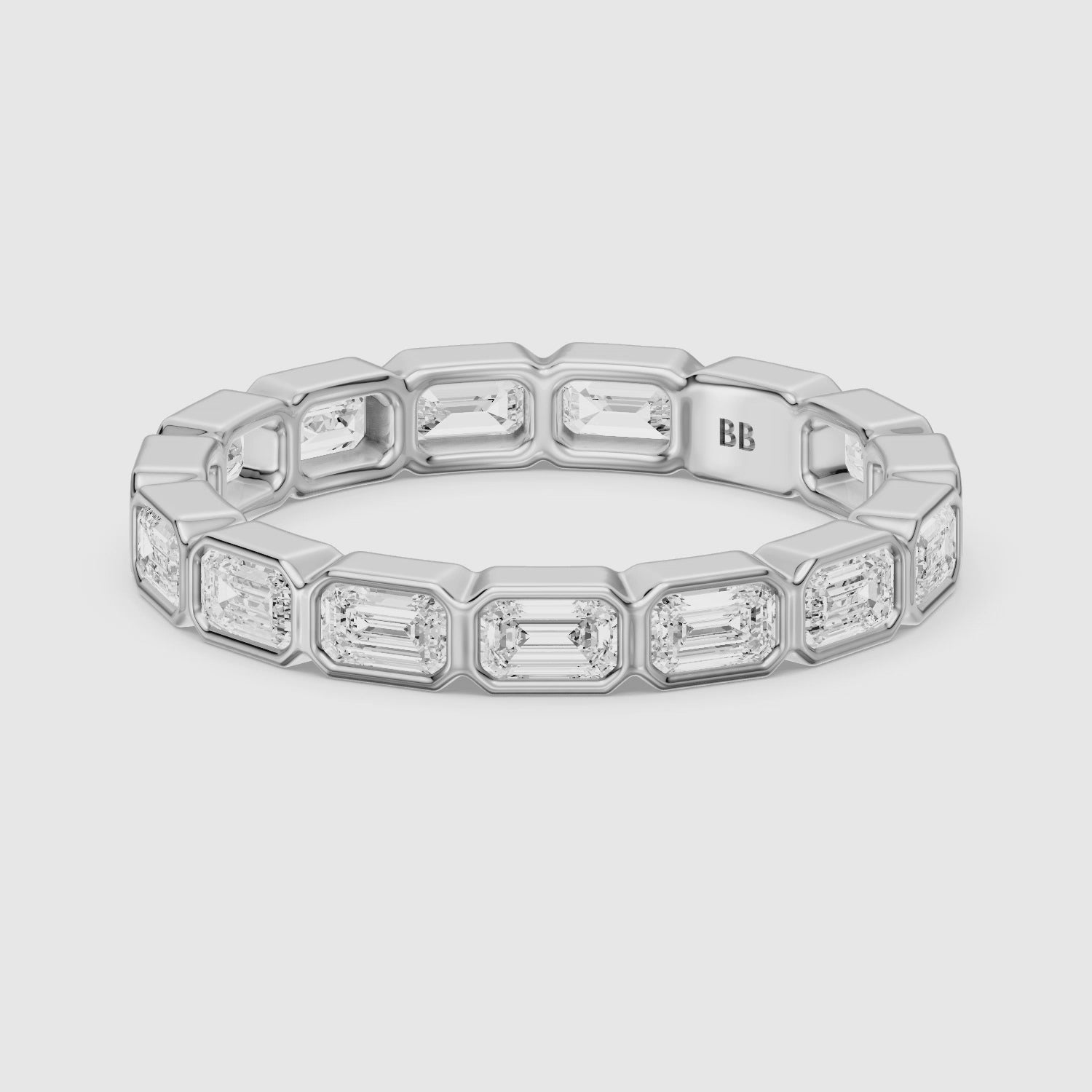 Load video: Billie Emerald Cut Bezel Set Lab Grown Diamond Eternity Wedding Band