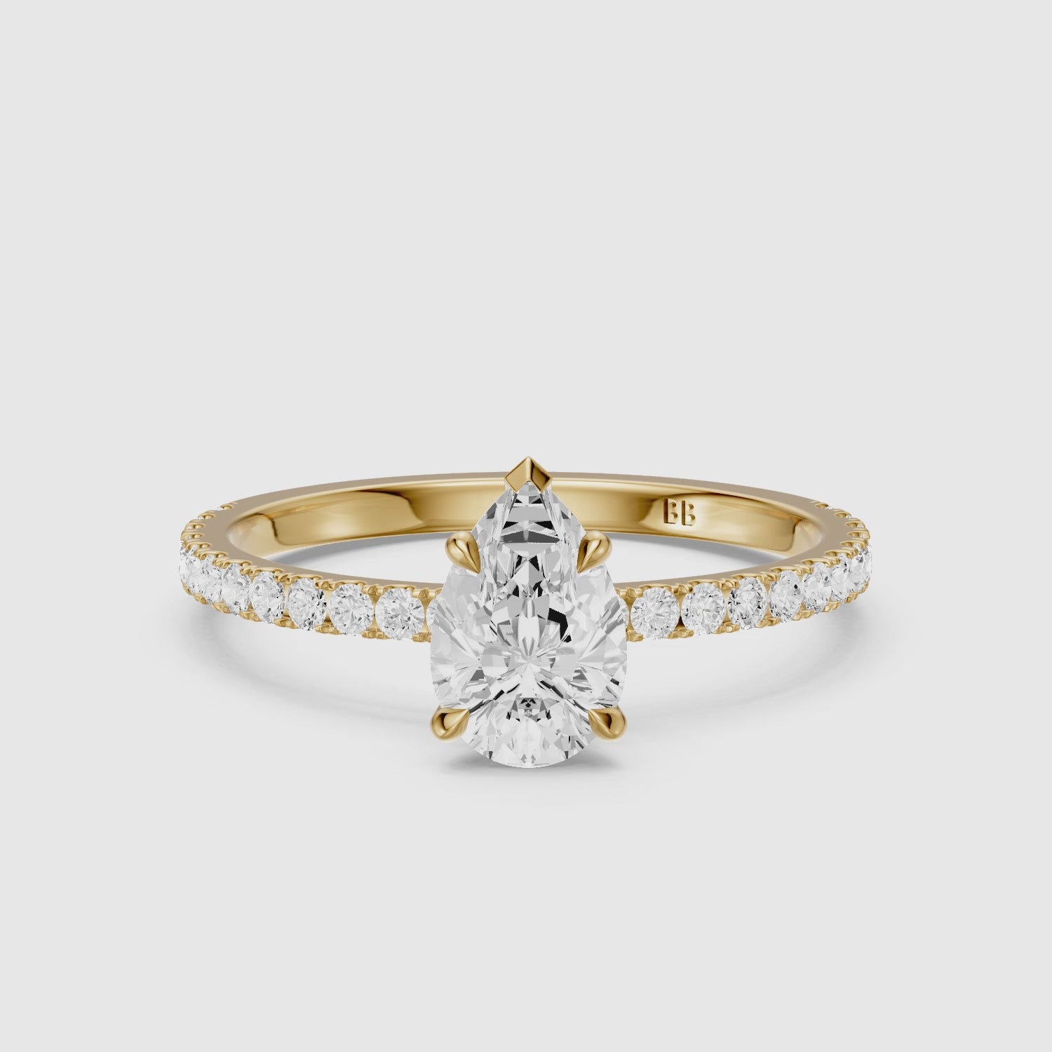 Load video: Kailey 5 Prong Pear Cut Pave Side Stone Moissanite Diamond Ring