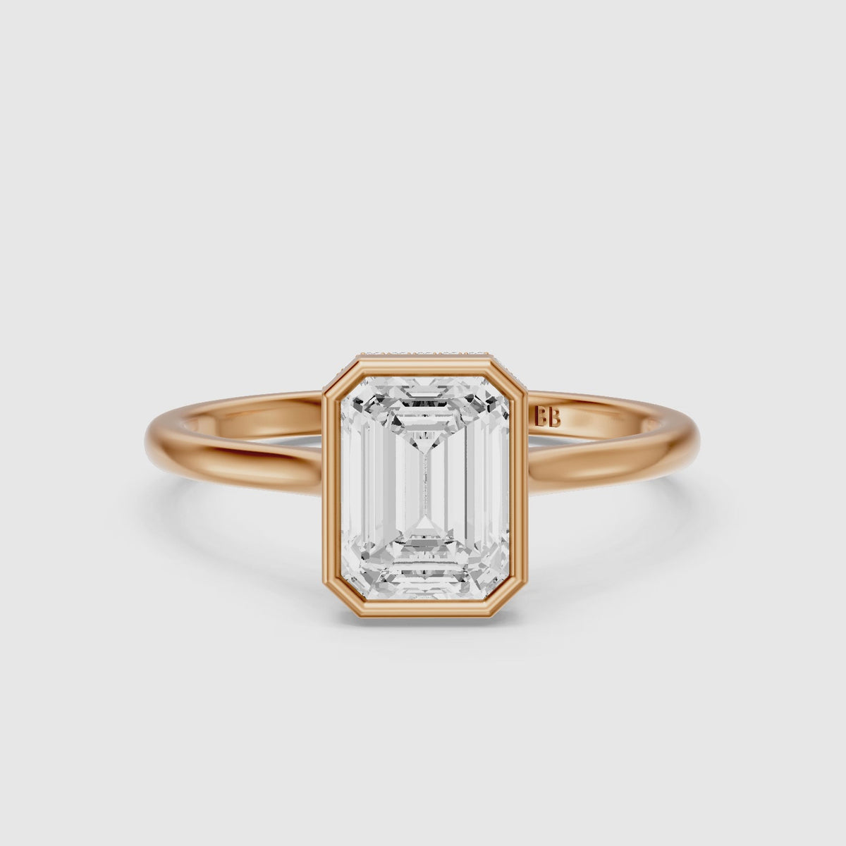 Load video: Anouk Emerald Cut Bezel Lab Grown Diamond Engagement Ring with Hidden Halo