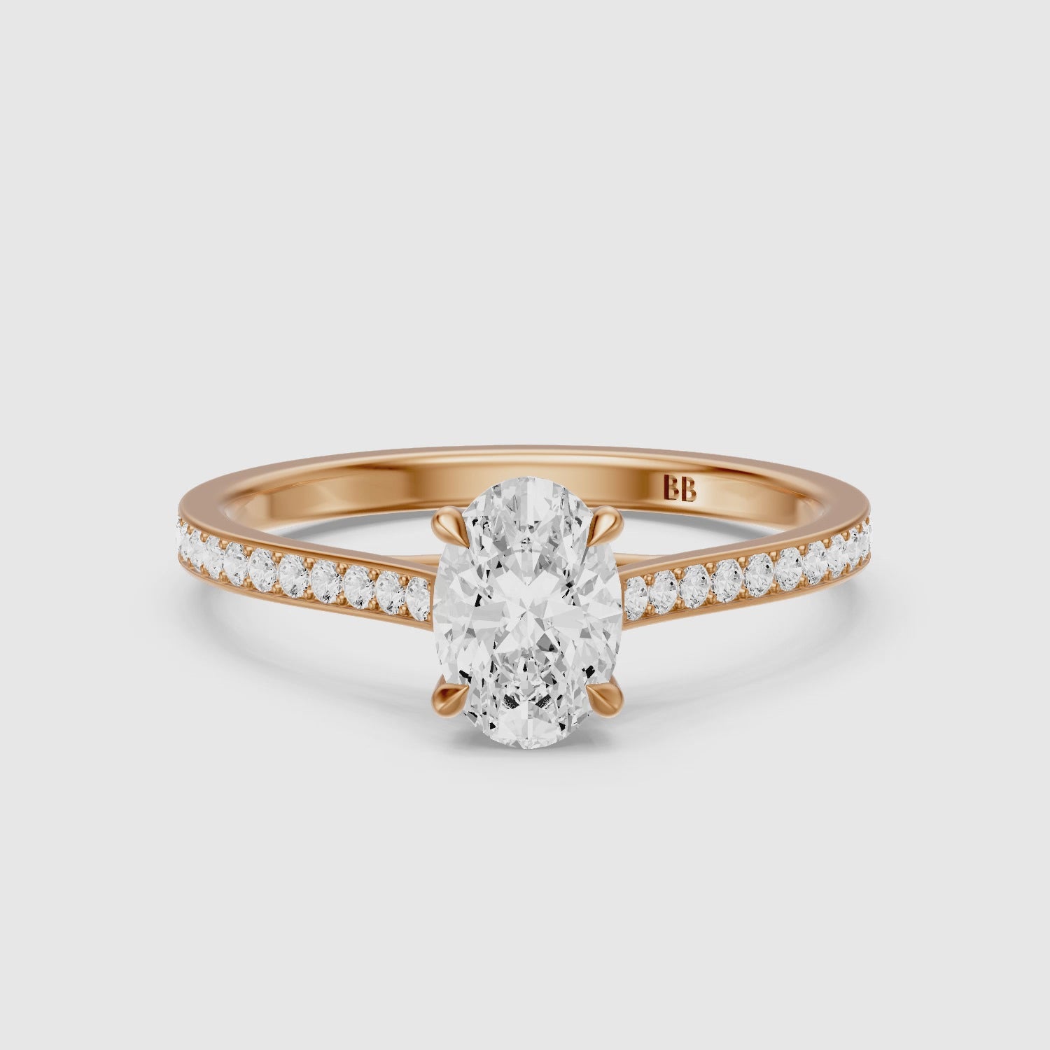 Load video: Kairen 4 Prong Oval Cut Side Stone Channel Set Moissanite Diamond Ring