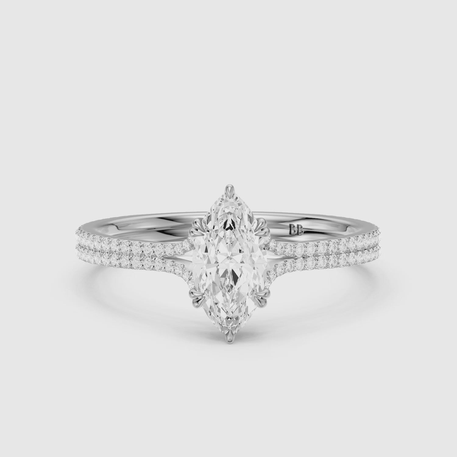 Load video: Evie Marquise Lab Grown Diamond Ring with Double Claw Prong and Pave Band
