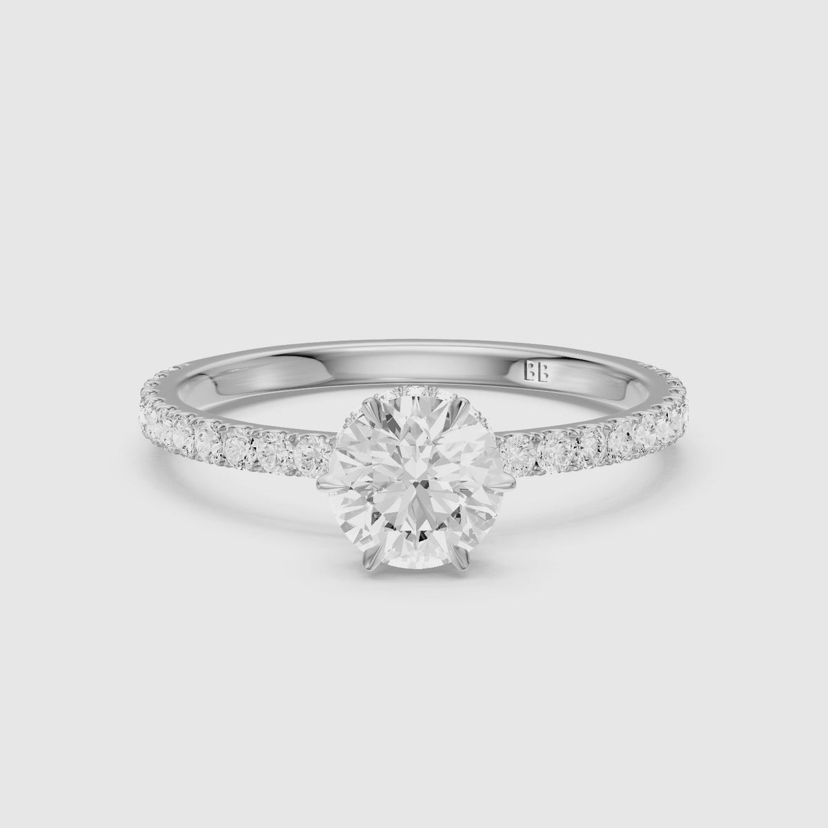 Load video: Sena Round Hidden Halo Lab Grown Diamond Engagement Ring with Pavé Band