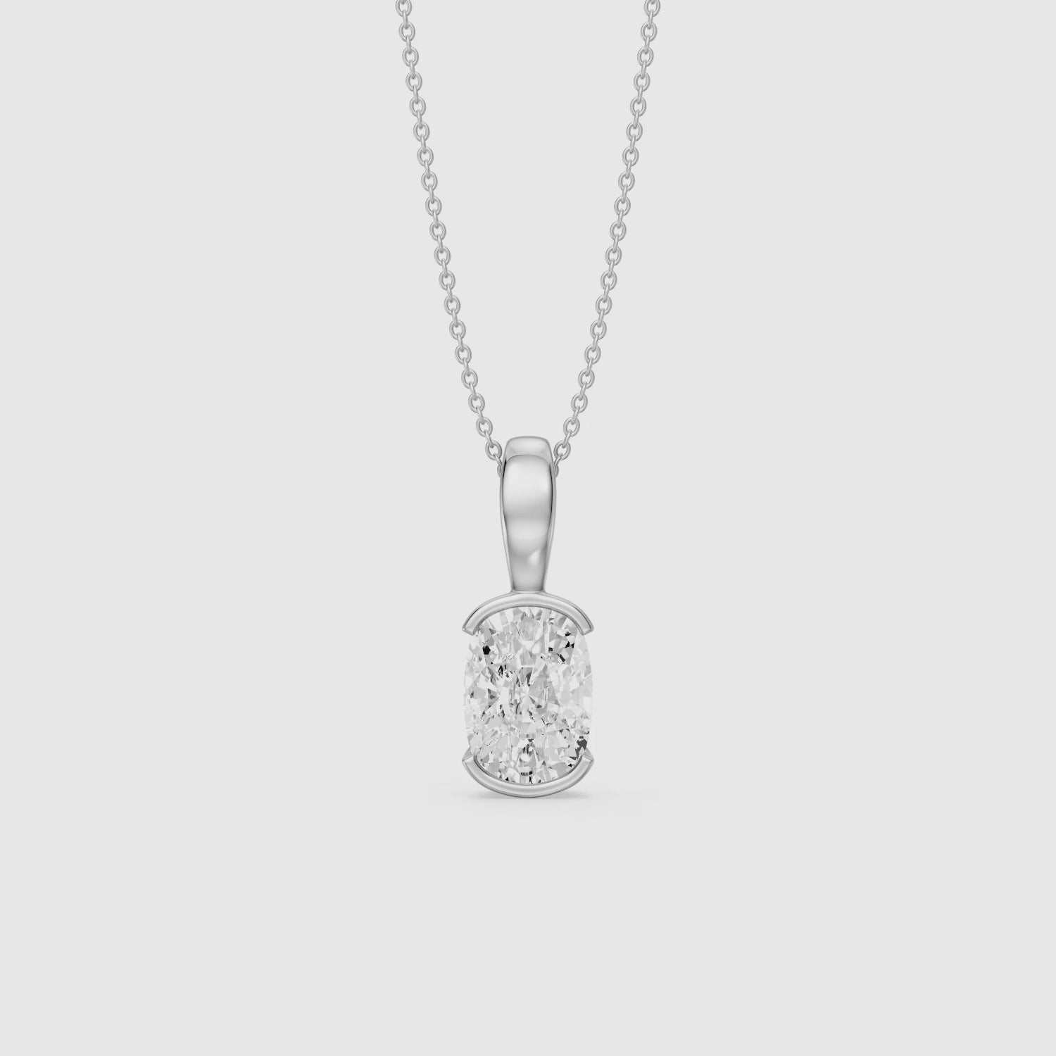 Load video: Raya Elongated Cushion Half Bezel Lab Grown Diamond Pendant