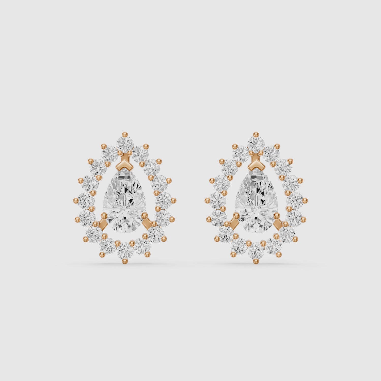 Load video: Zana Pear and Round Lab Grown Diamond Halo Stud Earrings