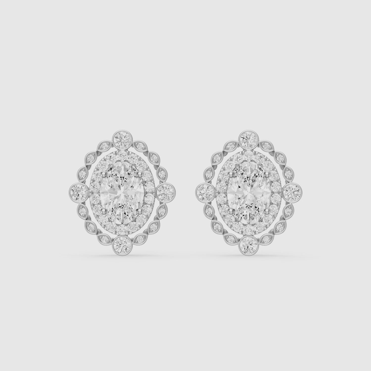 Load video: Evadne Oval and Round Lab Grown Diamond Double Halo Stud Earrings
