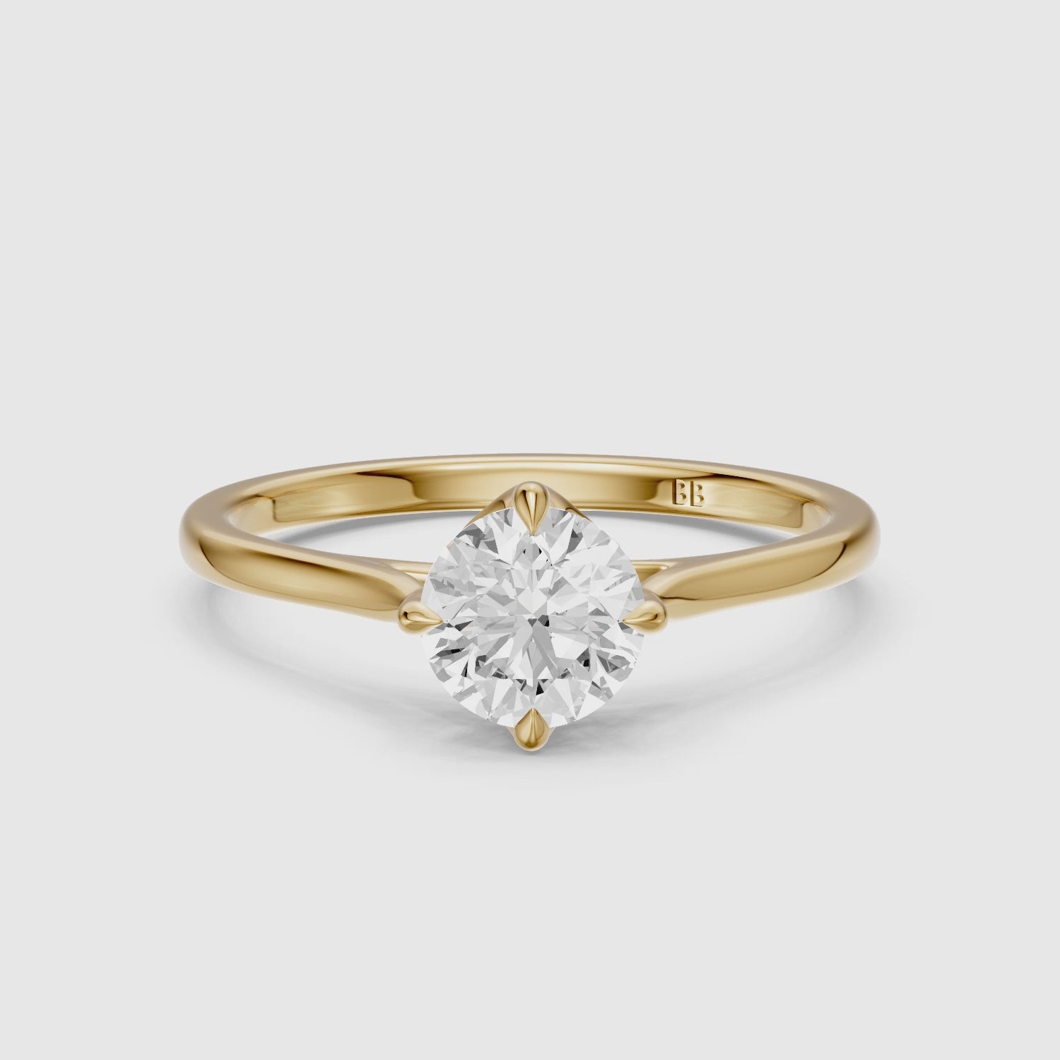 Load video: Brynna 4 Prong Round Cut Solitaire Moissanite Diamond Ring