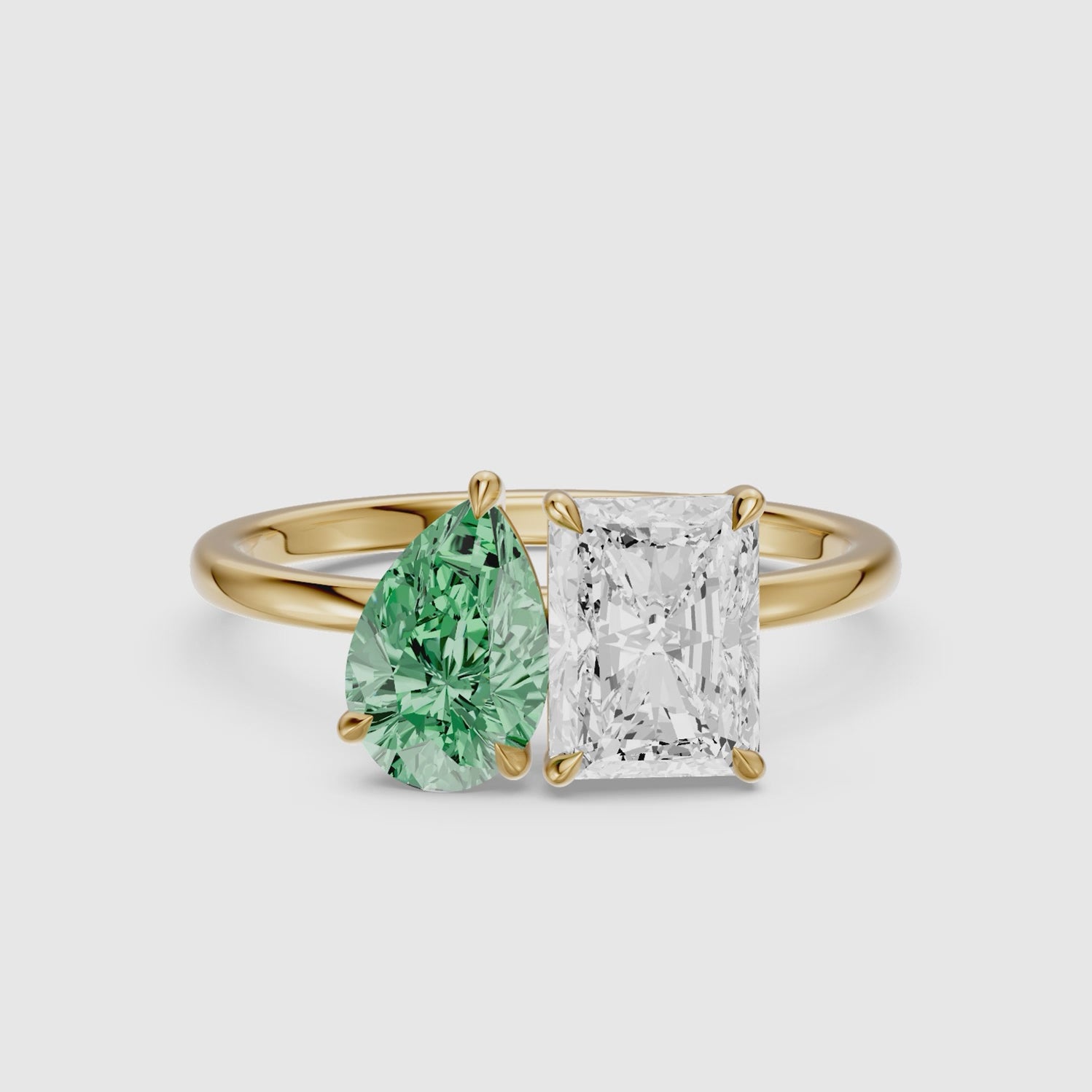 Load video: Wenna Green Pear and Radiant Cut Colored Lab Grown Diamond Toi et Moi Ring