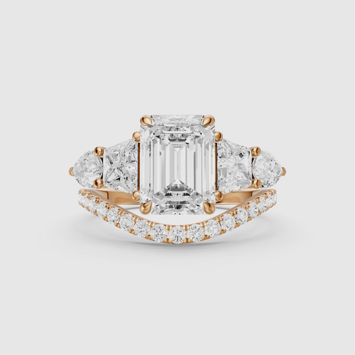 Load video: Nyla Five Stone Emerald Cut Lab Grown Diamond Bridal Set with Curved Pave Band