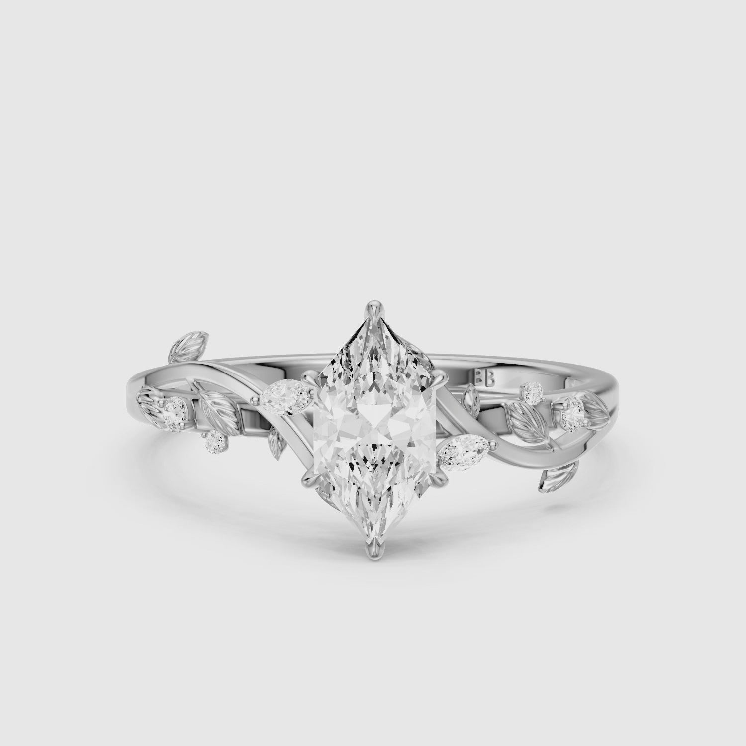 Load video: Eva Dutch Marquise Moissanite Diamond Ring with Leaf Vine Band