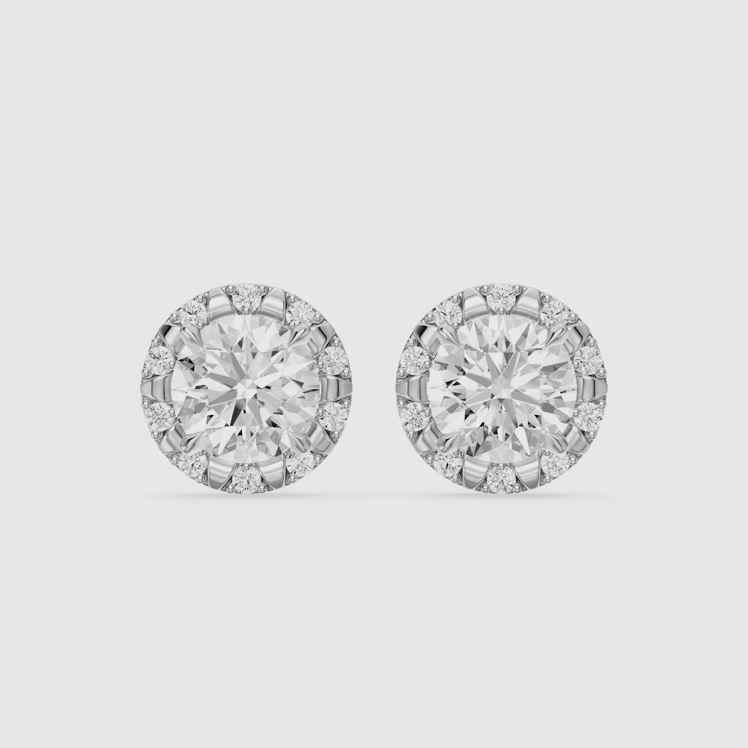 Load video: Sabella Round Lab Grown Diamond Crown Halo Stud Earrings