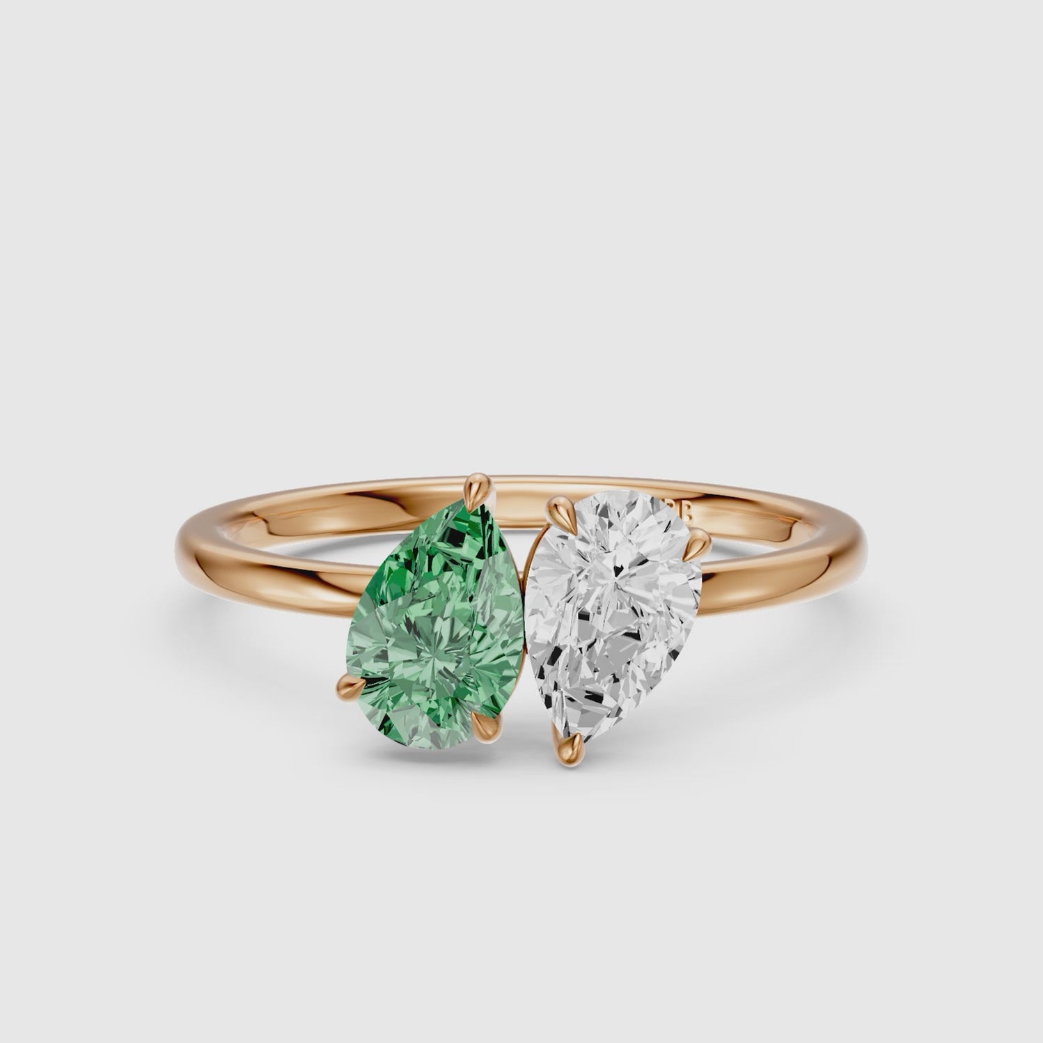 Load video: Asta Green and White Both Pear Cut Color Lab Grown Diamond Toi et Moi Ring