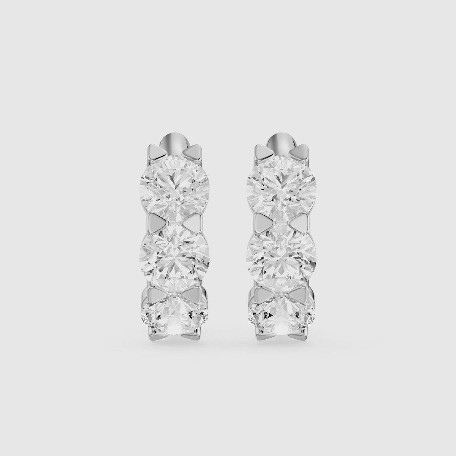 Load video: Kari Round Lab Grown Diamond Three Stone Huggie Hoop Earrings