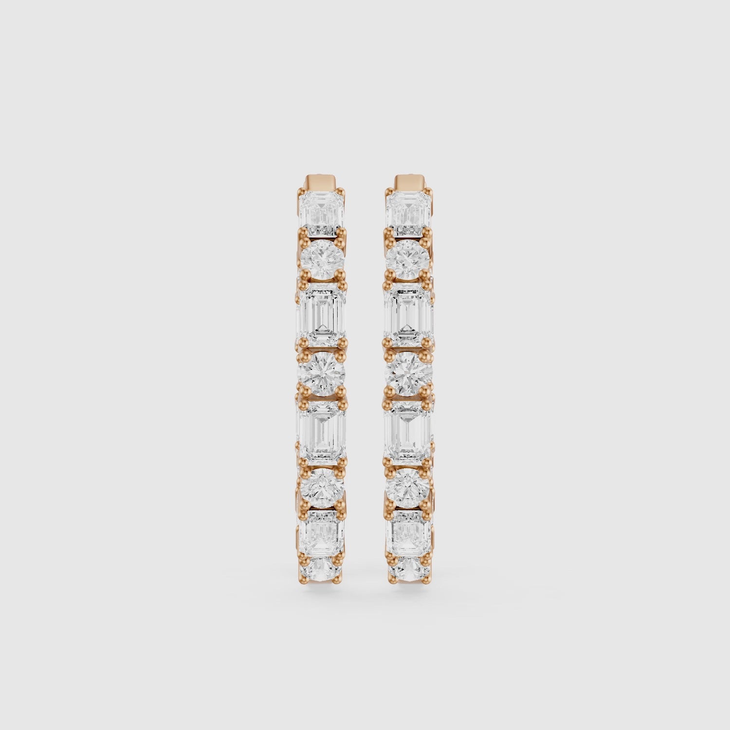 Load video: Kleio Emerald Cut and Round Cut Diamond Inside Out Hoop Earrings