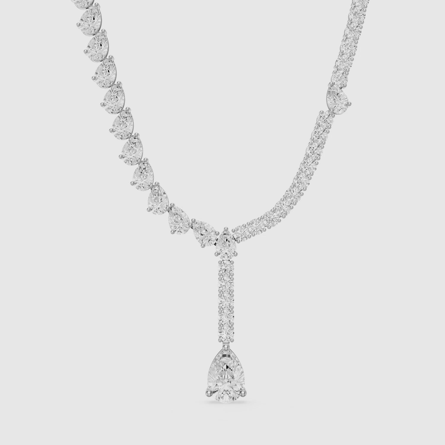 Load video: Audrey Pear Cut Lab Grown Diamond Drop Tennis Necklace