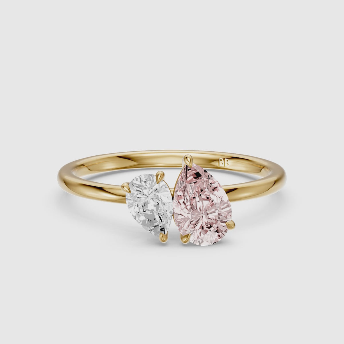Load video: Kasia Pink and White Graduated Pear Shape Color Lab Grown Diamond Toi et Moi Ring