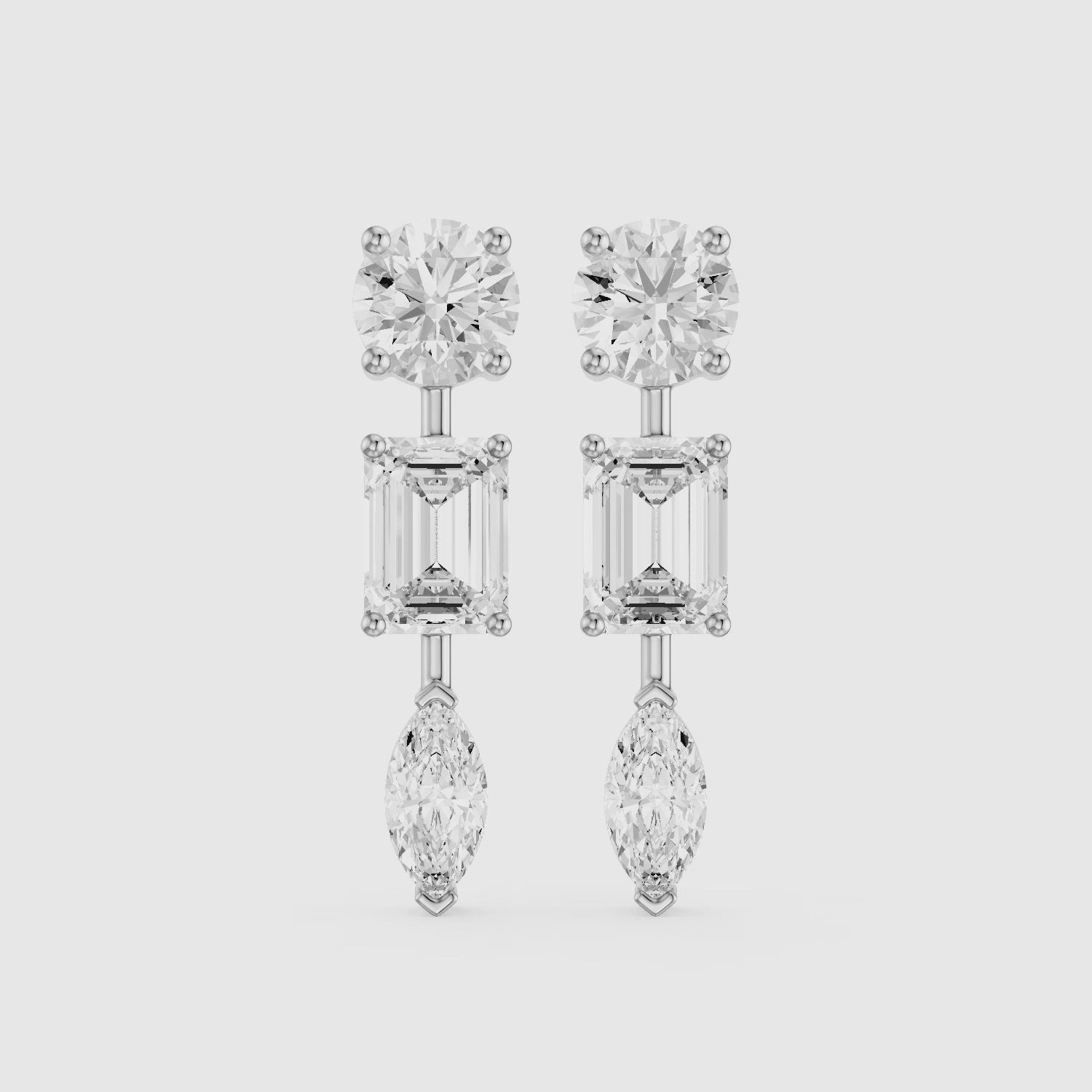 Load video: Elysia Round, Emerald, and Marquise Lab Grown Diamond Dangle Earrings