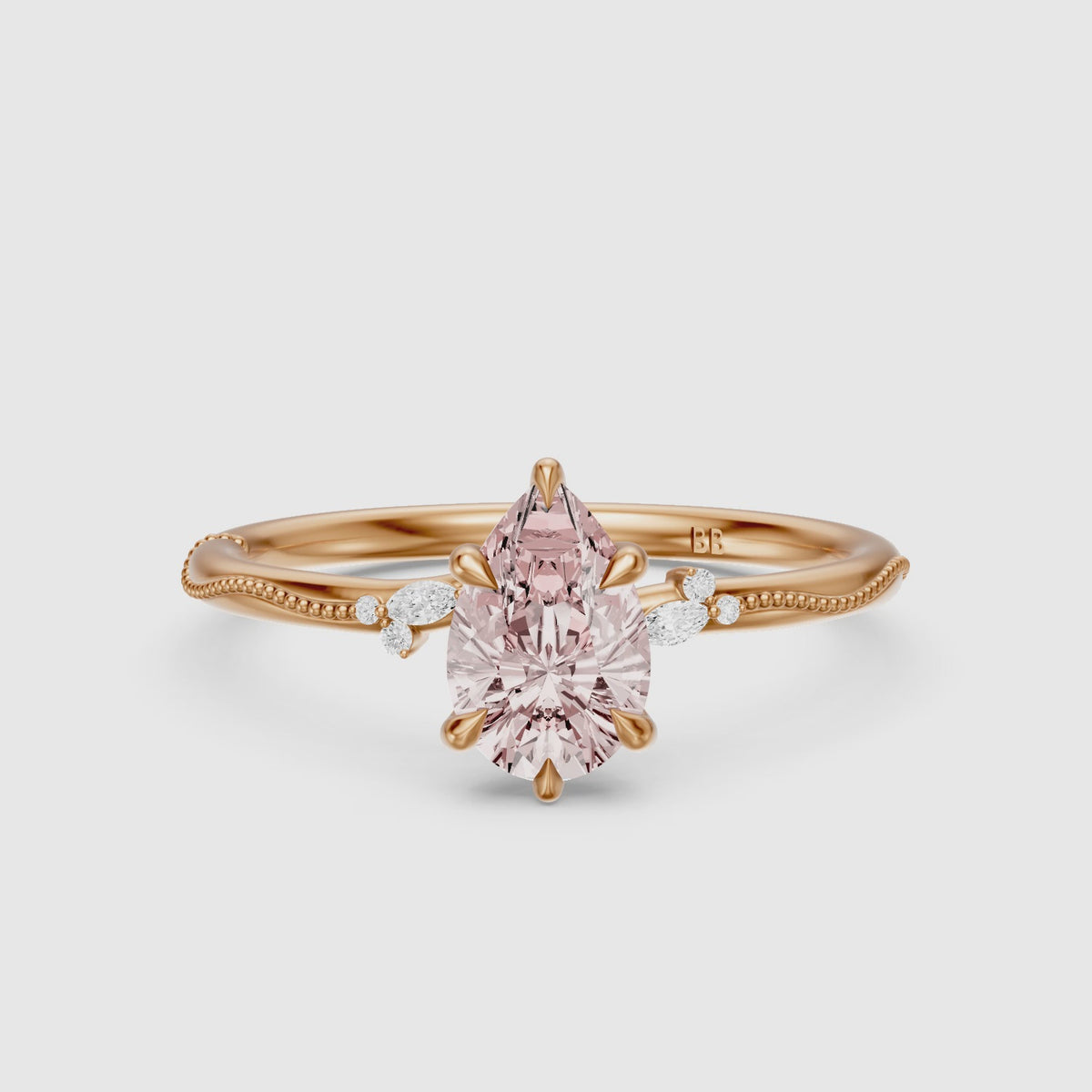 Load video: Bria Pear Cut Pink Lab Grown Diamond Side Stone Ring with Milgrain Band