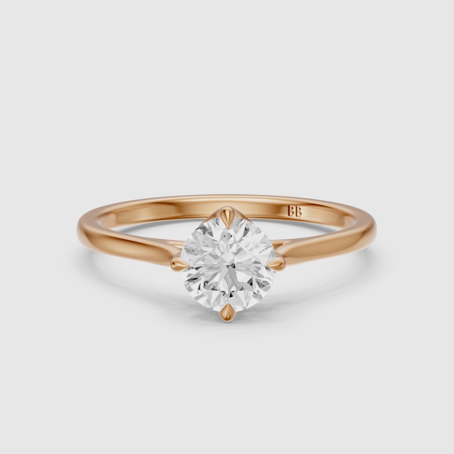 Load video: Brynna 4 Prong Round Cut Solitaire Moissanite Diamond Ring