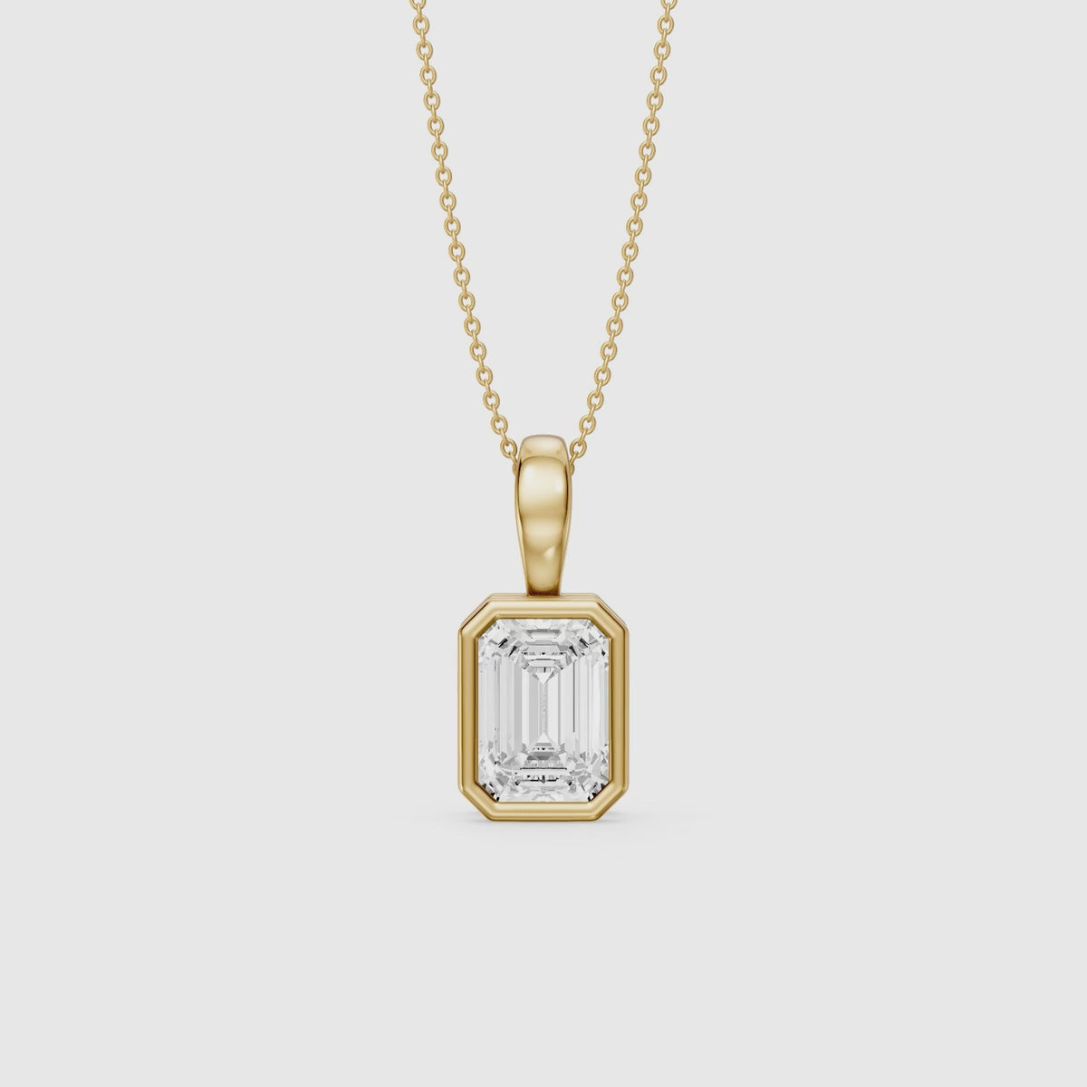 Load video: Lisa Emerald Bezel Set Lab Grown Diamond Solitaire Pendant