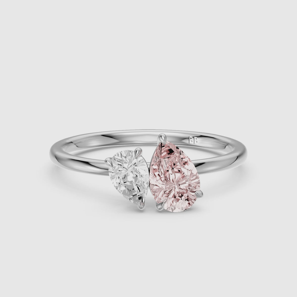 Load video: Kasia Pink and White Graduated Pear Shape Color Lab Grown Diamond Toi et Moi Ring