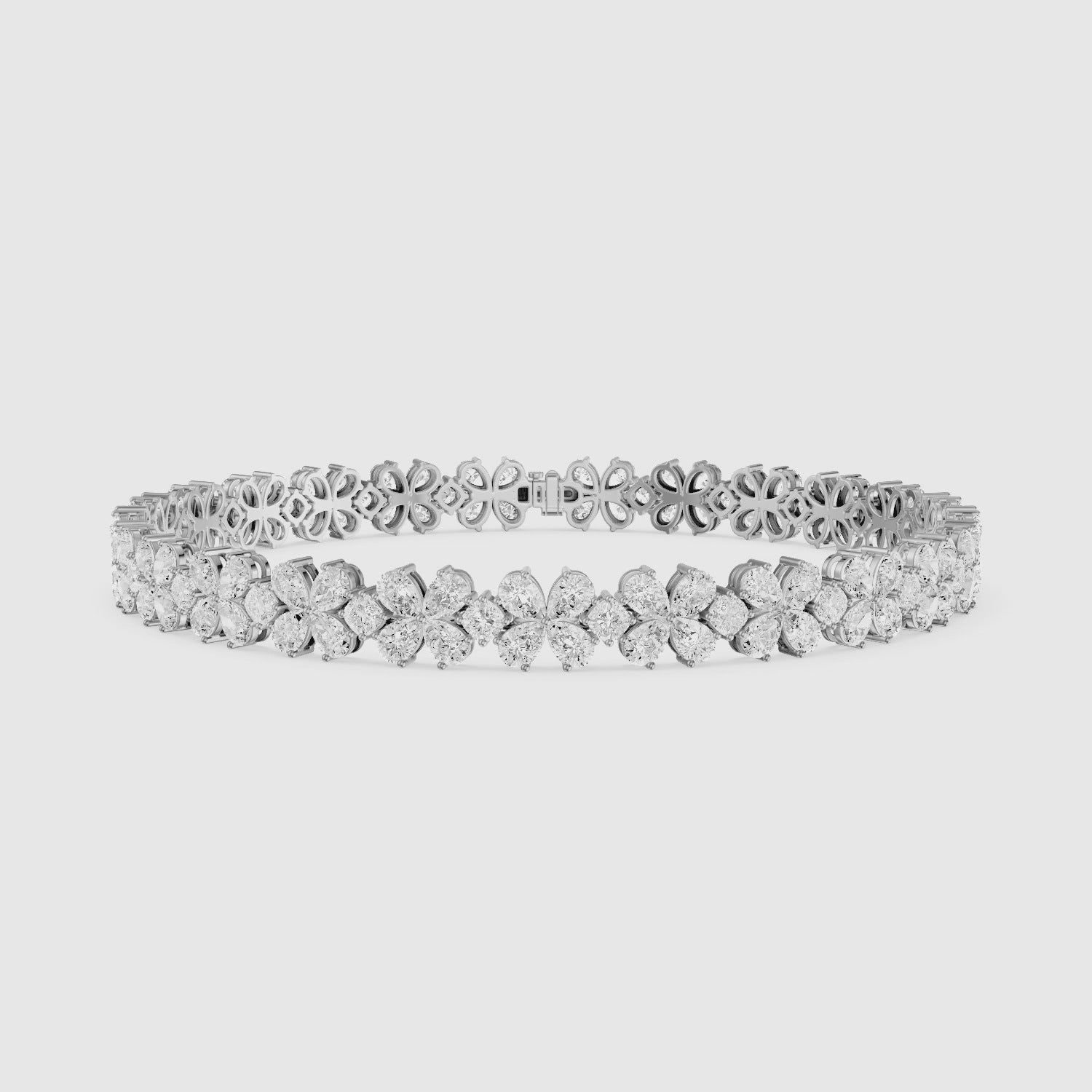 Load video: Cora Pear and Princess Cut Floral Lab Grown Diamond Tennis Bracelet