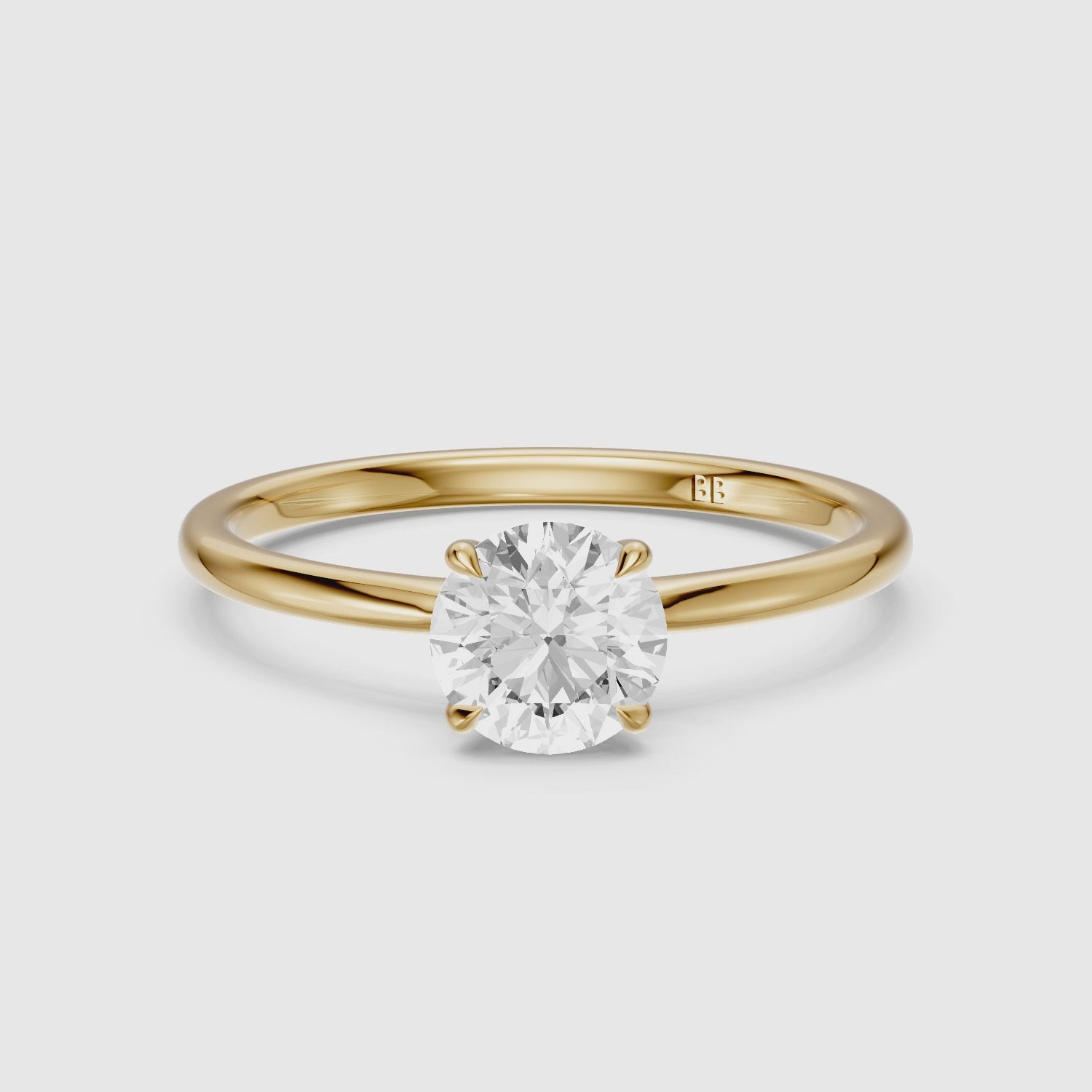 Load video: Carmen 4 Prong Round Cut Solitaire Moissanite Diamond Ring