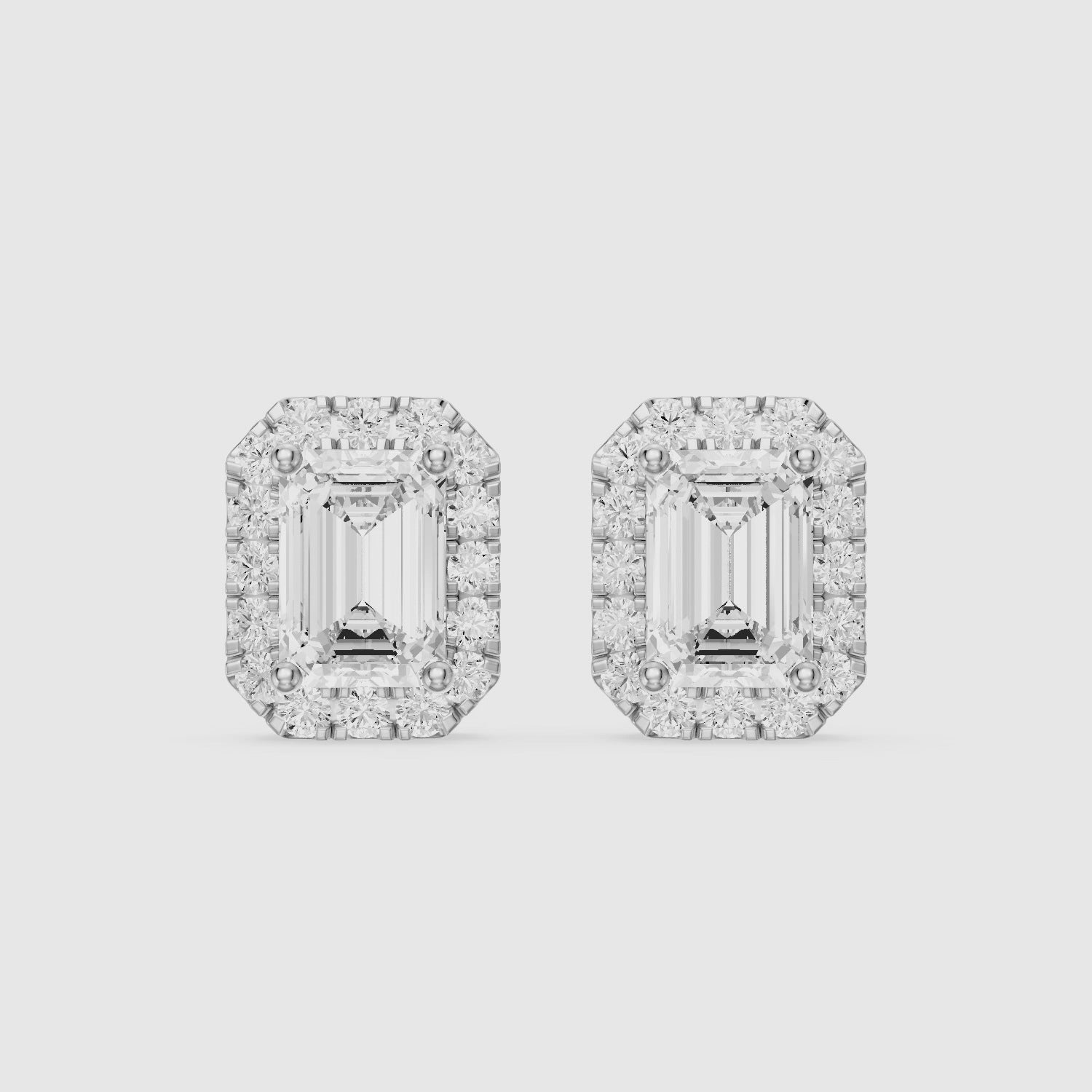 Load video: Briseis Emerald Cut Lab Grown Diamond Halo Frame Stud Earrings
