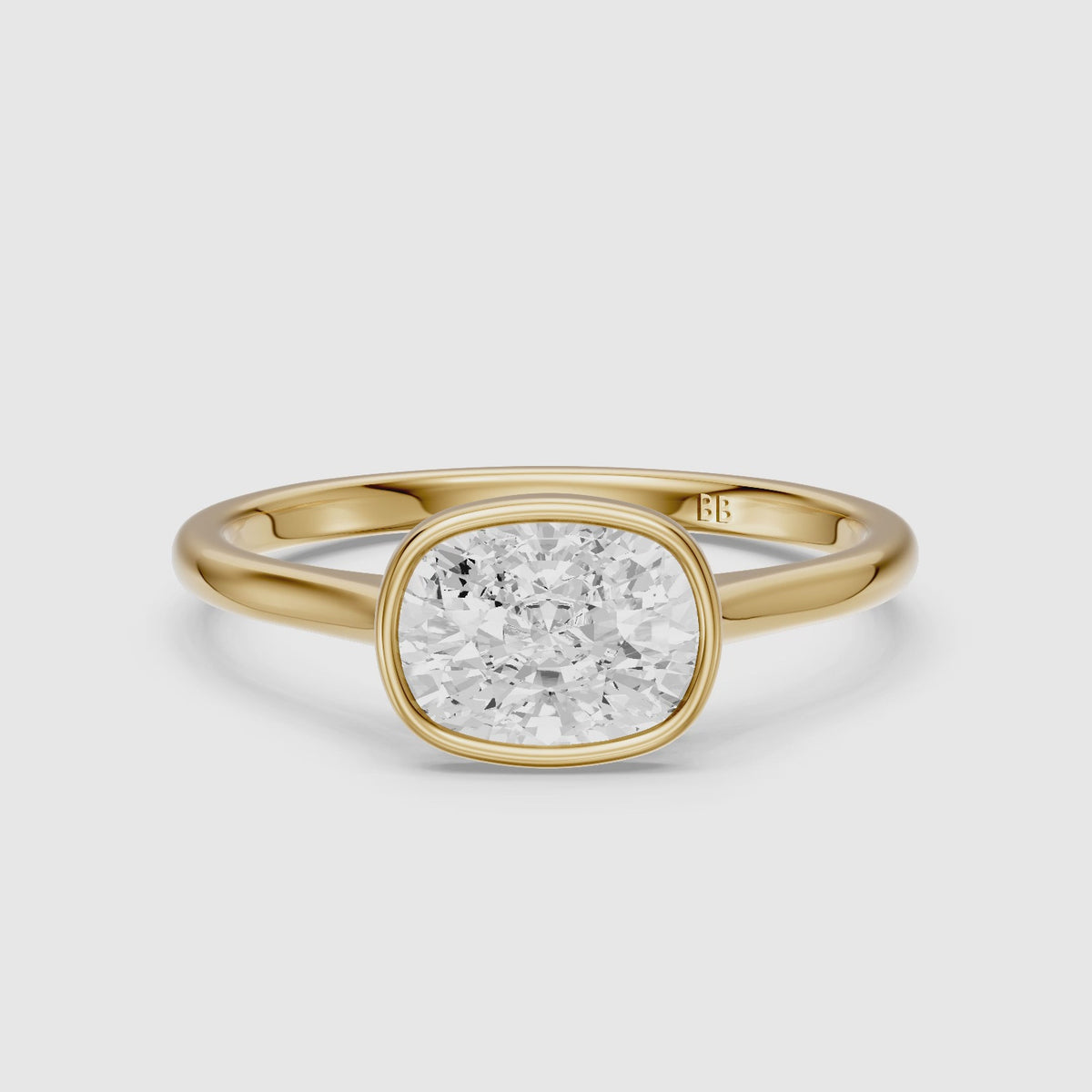 Load video: Yuna East West Cushion Lab Grown Diamond Bezel Set Solitaire Ring