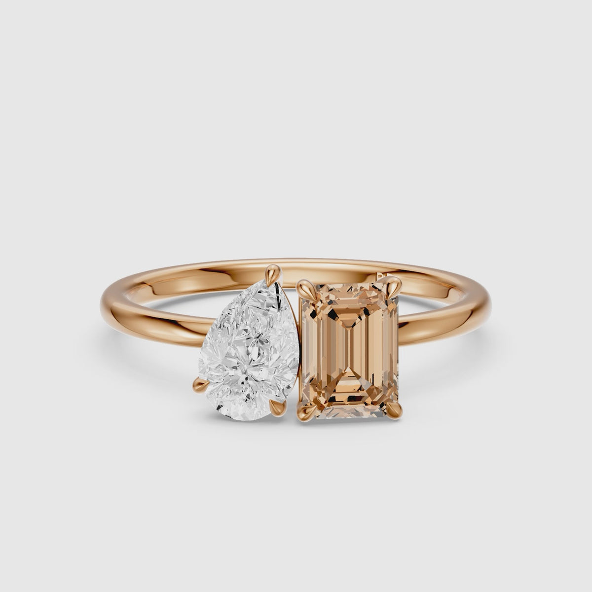 Load video: Bojana Champagne Emerald Cut and Pear Shape Color Lab Grown Diamond Toi et Moi Ring