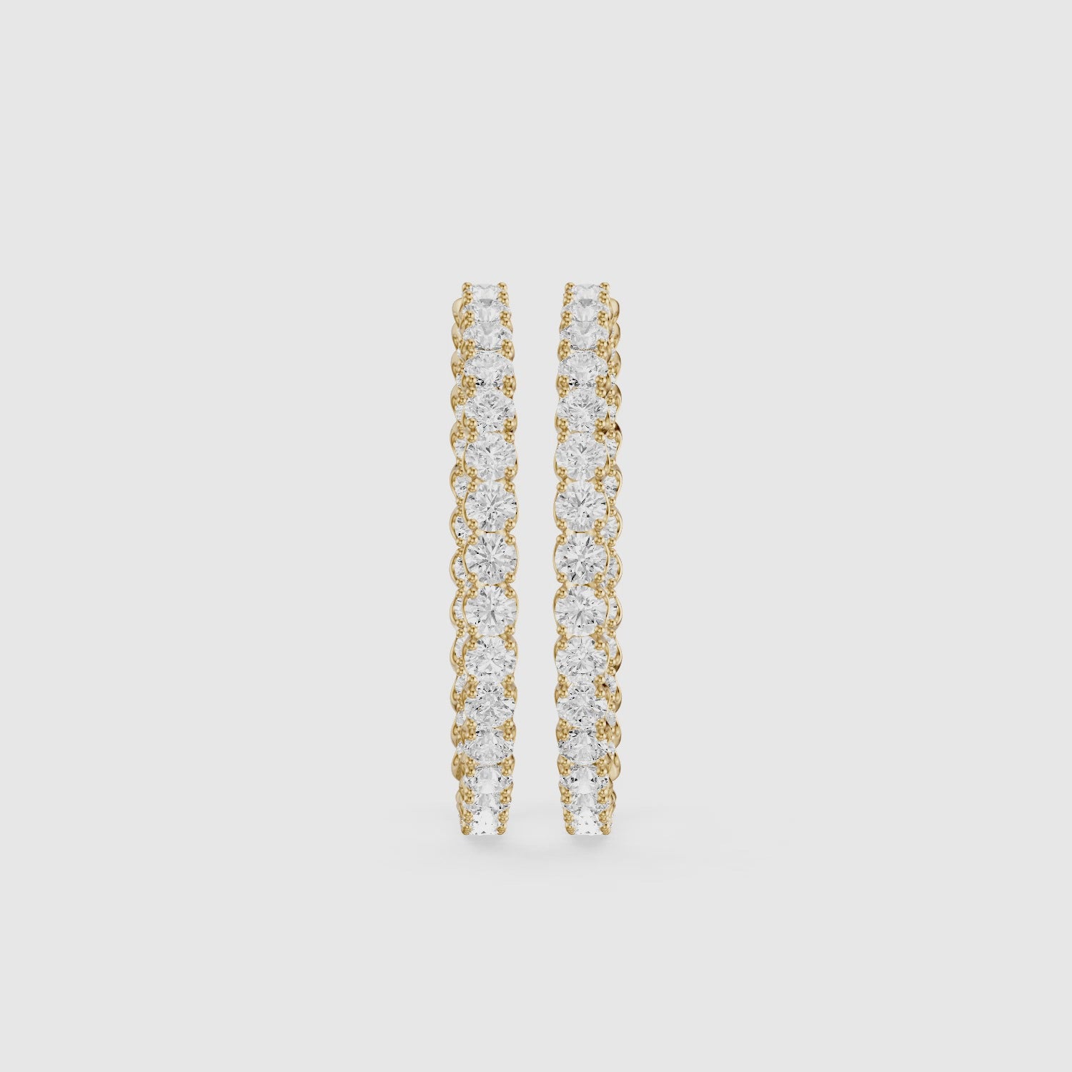 Load video: Solange Four Prong Round Lab Grown Diamond Inside Out Hoop Earrings
