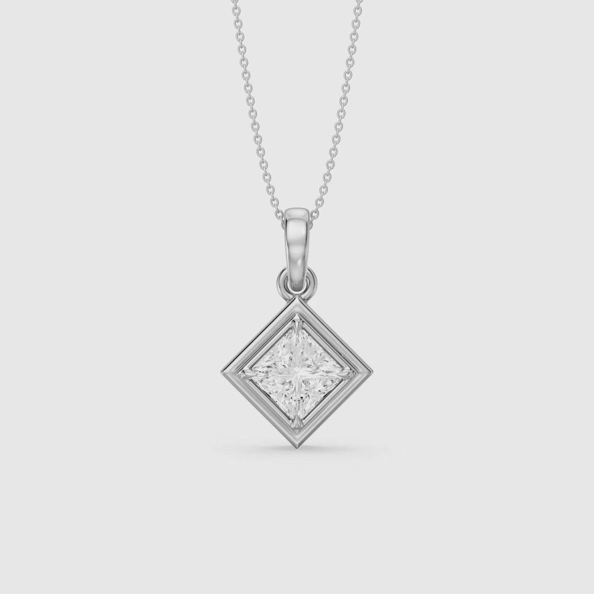 Load video: Macie East West Princess Cut Lab Grown Diamond Solitaire Bezel Pendant