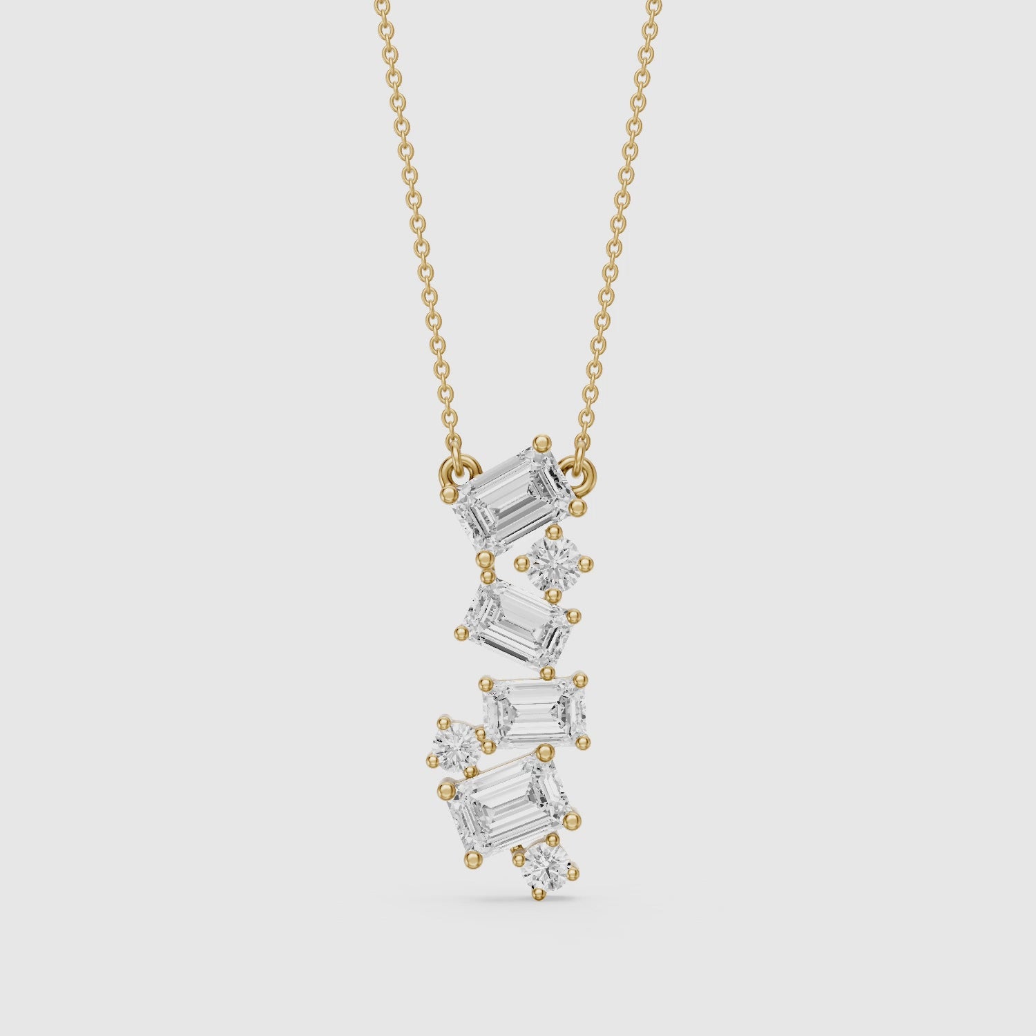 Load video: Paula Emerald Cut and Round Lab Grown Diamond Cascade Pendant