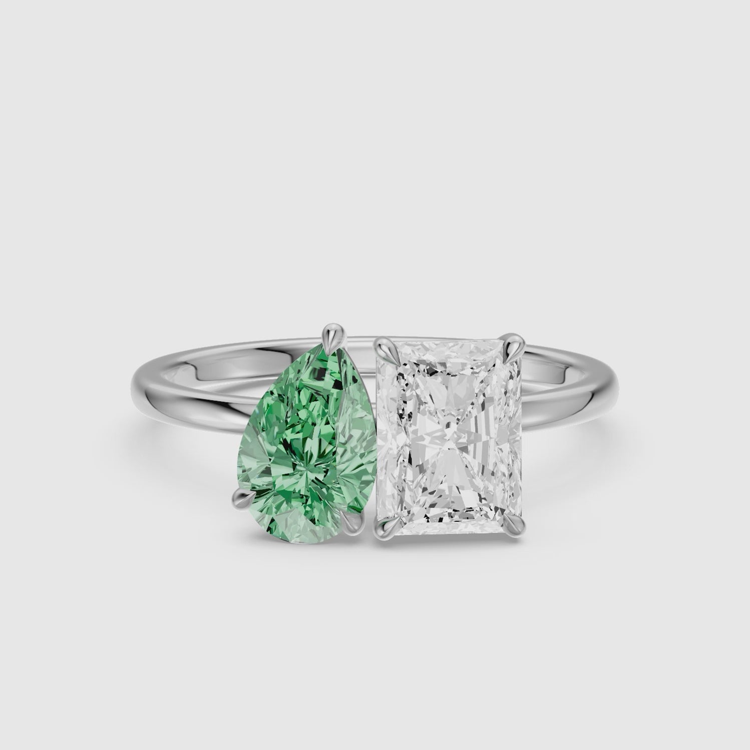 Load video: Wenna Green Pear and Radiant Cut Colored Lab Grown Diamond Toi et Moi Ring