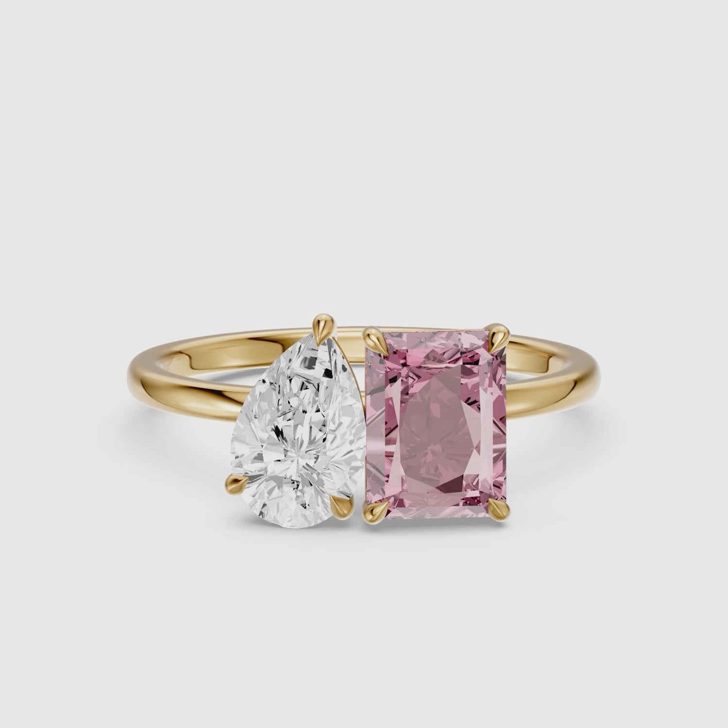 Load video: Liis Pink Radiant and Pear Cut Colored Lab Grown Diamond Toi et Moi Ring