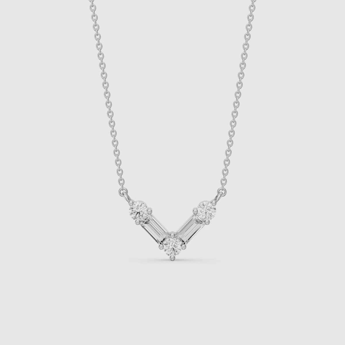 Load video: Marley Baguette and Round Lab Grown Diamond Chevron Pendant