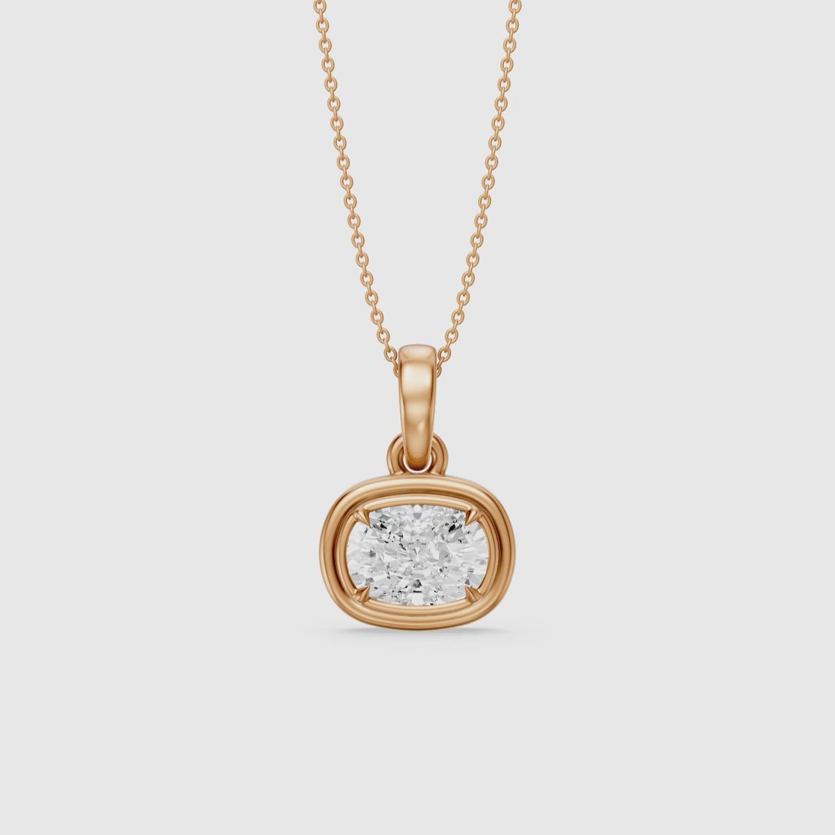 Load video: Carmen East West Elongated Cushion Cut Lab Grown Diamond Bezel Pendant