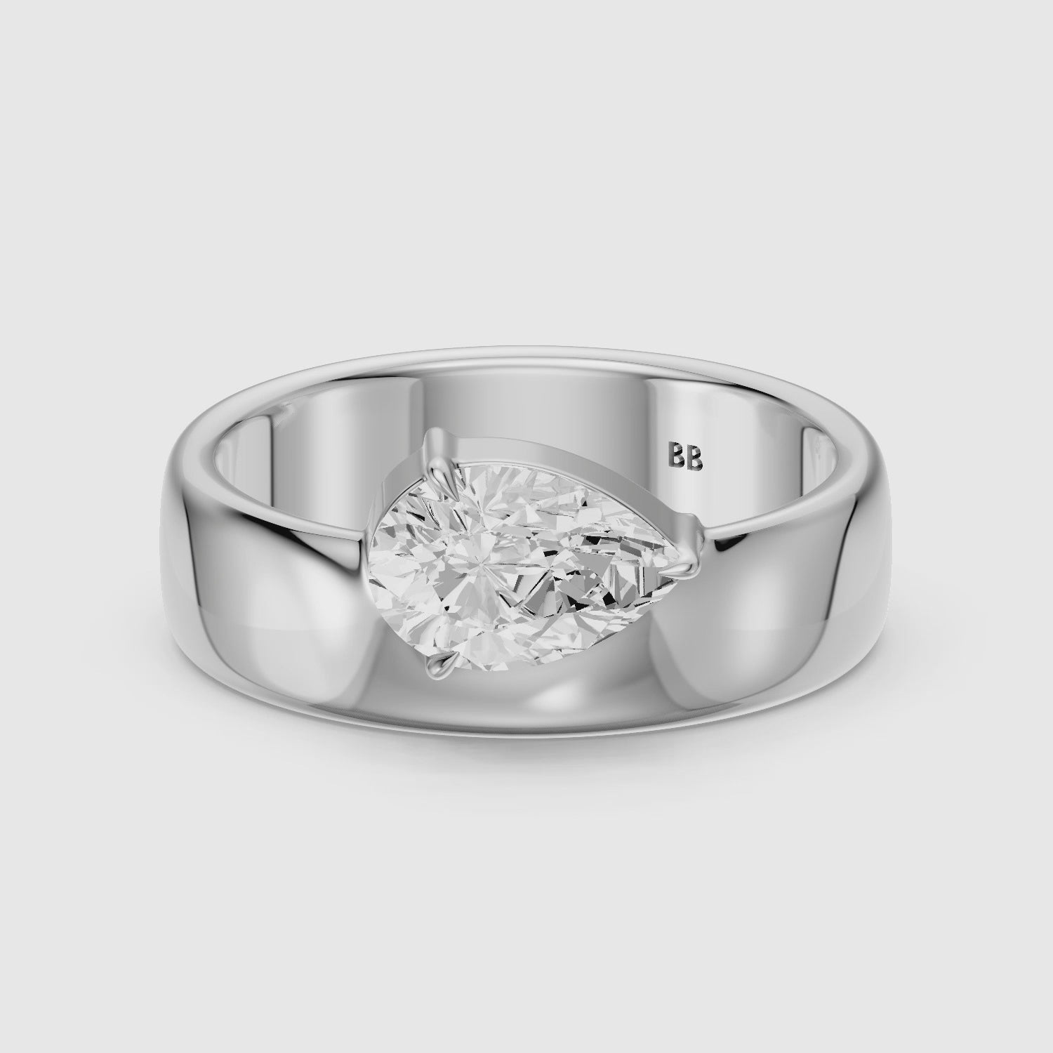 Load video: Karter Pear Cut Lab Diamond Prong Set Wide Cigar Band