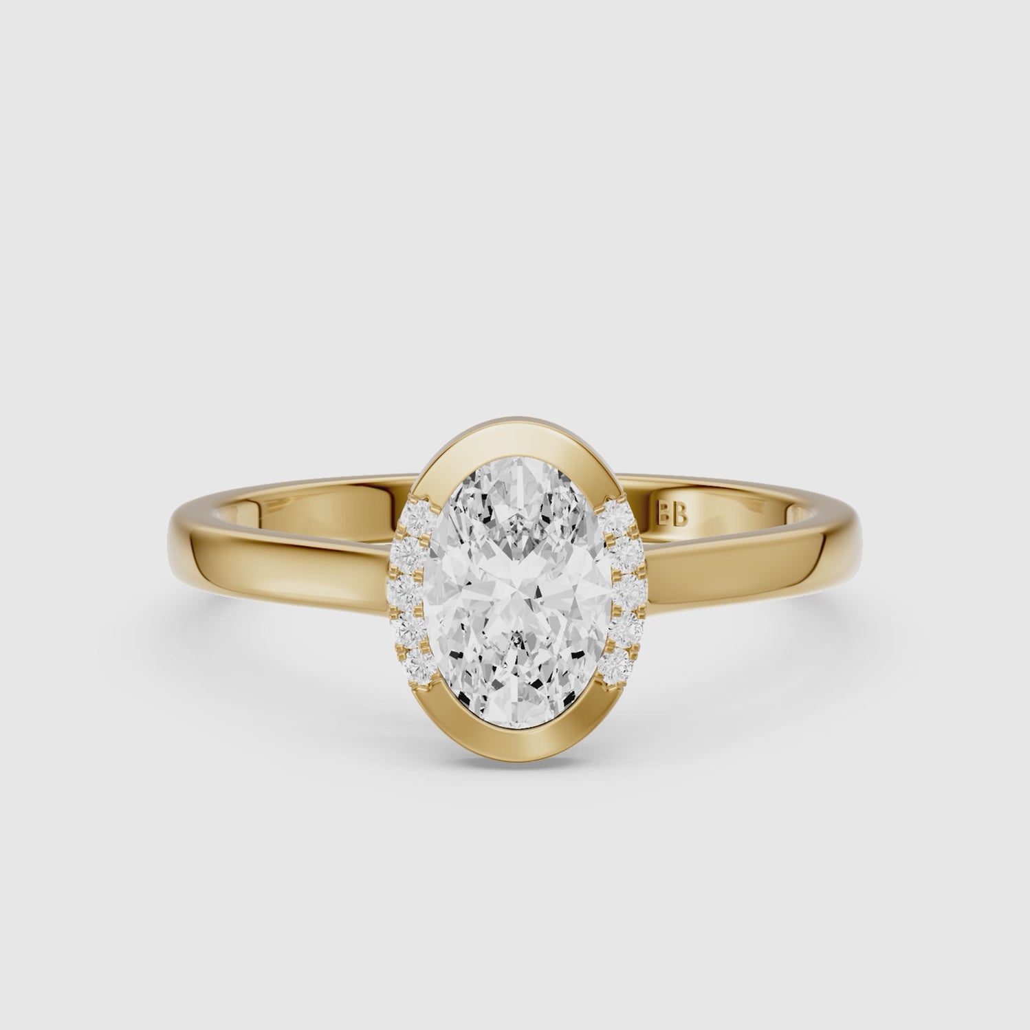 Load video: Lucy Oval Lab Grown Diamond Semi Bezel Hidden Halo Ring