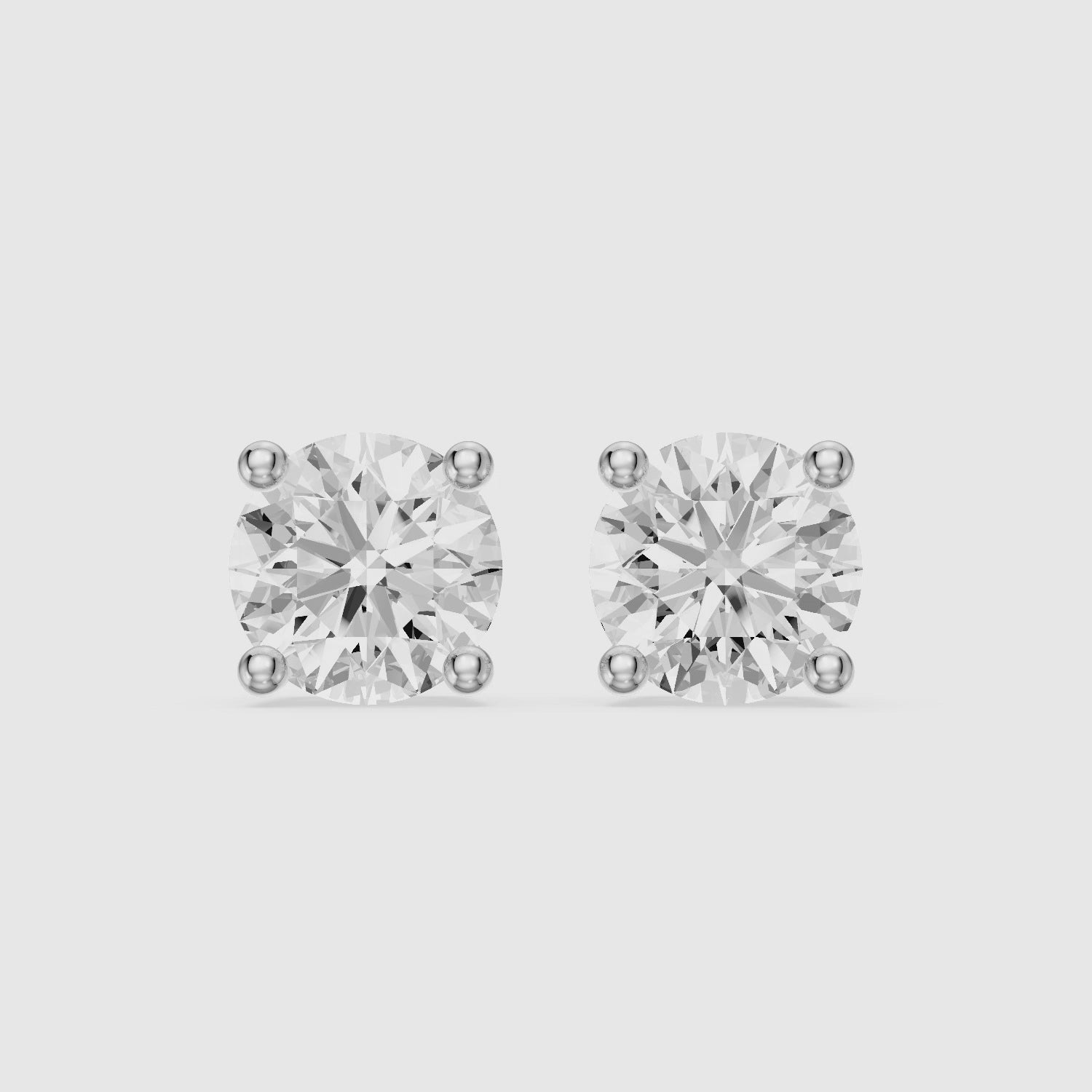 Load video: Alicia Round Cut Lab Grown Diamond Hidden Halo Stud Earrings