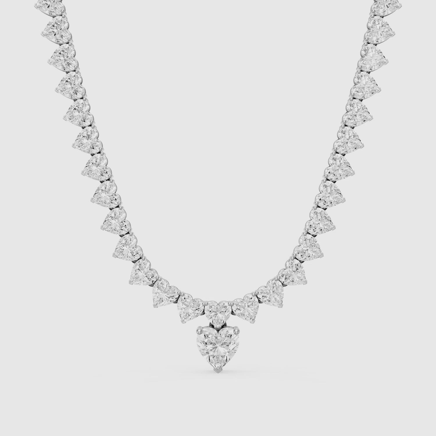Load video: Maeve Graduated Heart Lab Grown Diamond Drop Necklace